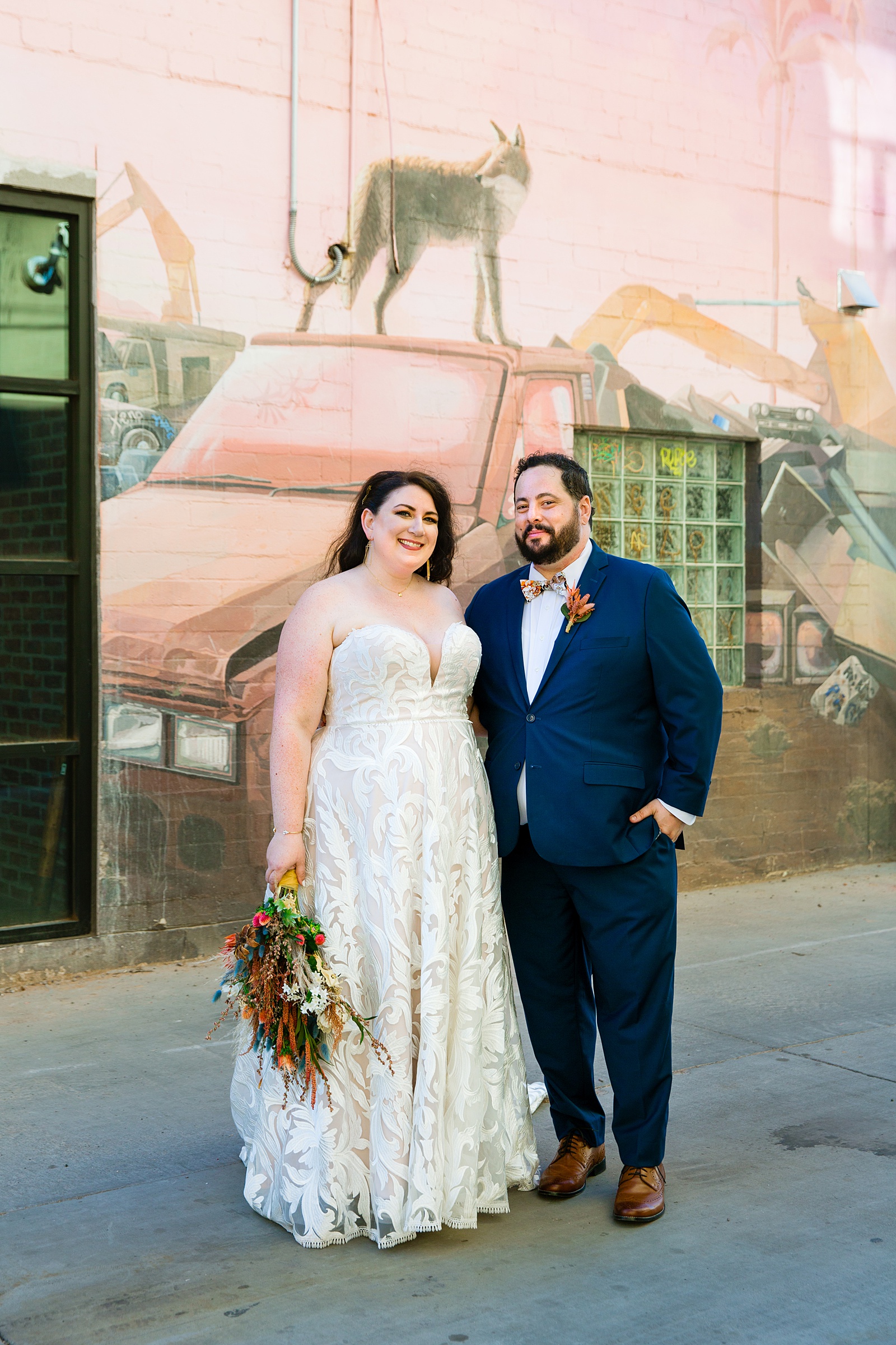 Bride and Groom pose during their MonOrchid wedding by Arizona wedding photographer PMA Photography.
