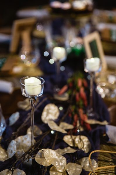 Close up of flameless candle reception decorations at MonOrchid wedding reception by Phoenix wedding photographer PMA Photography.
