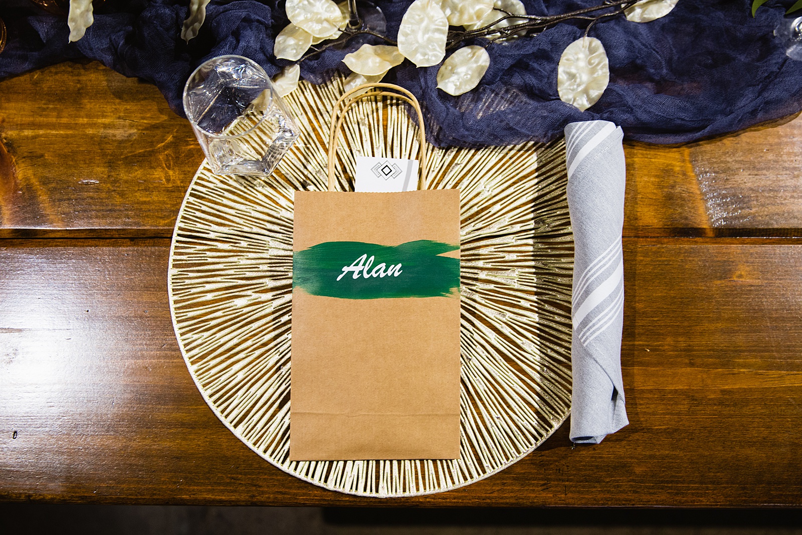 Custom giftbags and table name card for a wedding reception at MonOrchid by Phoenix wedding photographer PMA Photography.