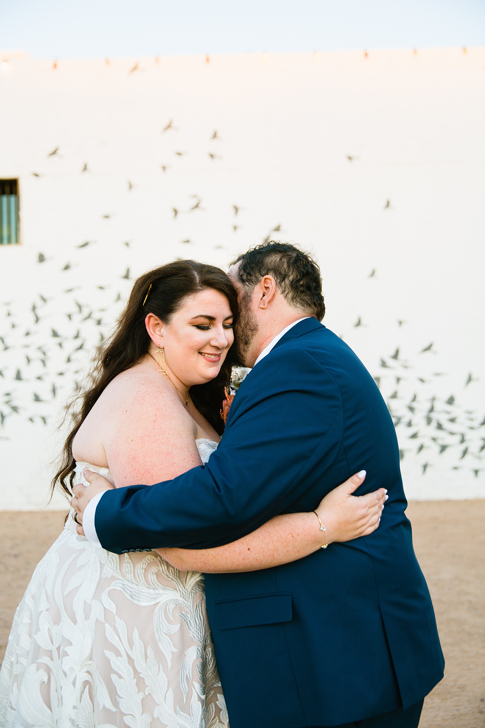 Bride and Groom share an intimate moment at their MonOrchid wedding by Arizona wedding photographer PMA Photography.