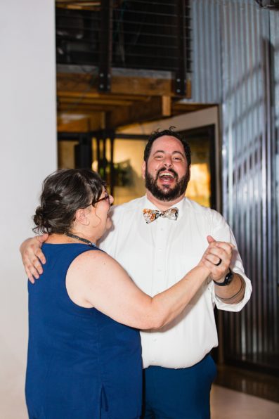 Groom dancing with mother at MonOrchid wedding reception by Phoenix wedding photographer PMA Photography