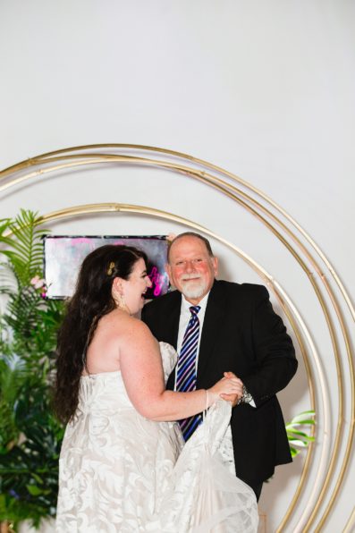 Bride dancing with father at MonOrchid wedding reception by Phoenix wedding photographer PMA Photography