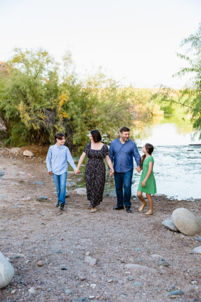 Family walking together during their Salt River family session by Phoenix family photographer PMA Photography.