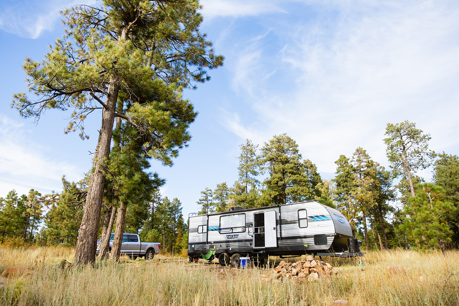 Bride and and groom's camper that they drove up to the Mogollon Rim for their adventure elopement by Arizona elopement photographers PMA Photography.