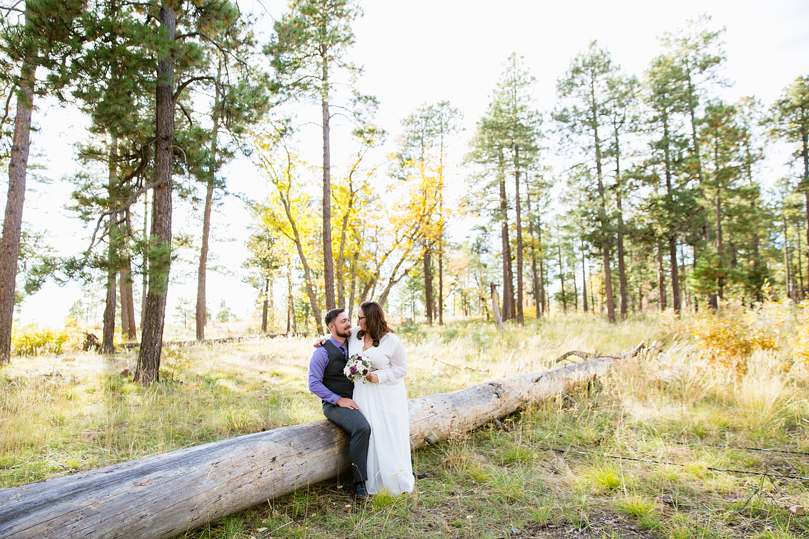 Bride and Groom share an intimate moment at their Mogollon Rim elopement by Arizona elopement photographer PMA Photography.