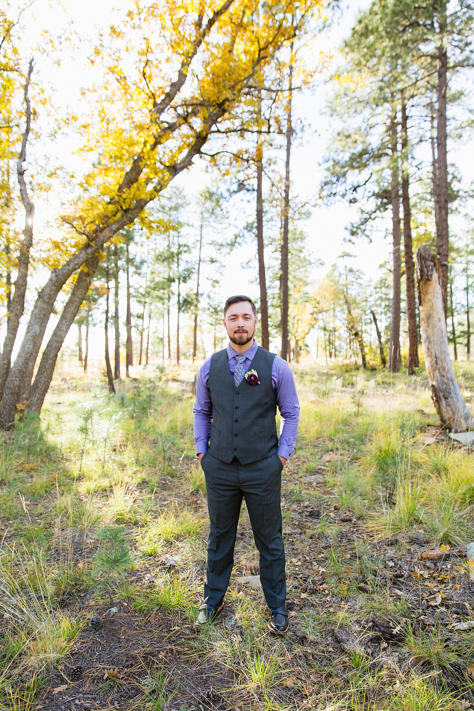 Groom's purple and grey suit for his Mogollon Rim elopement by PMA Photography.