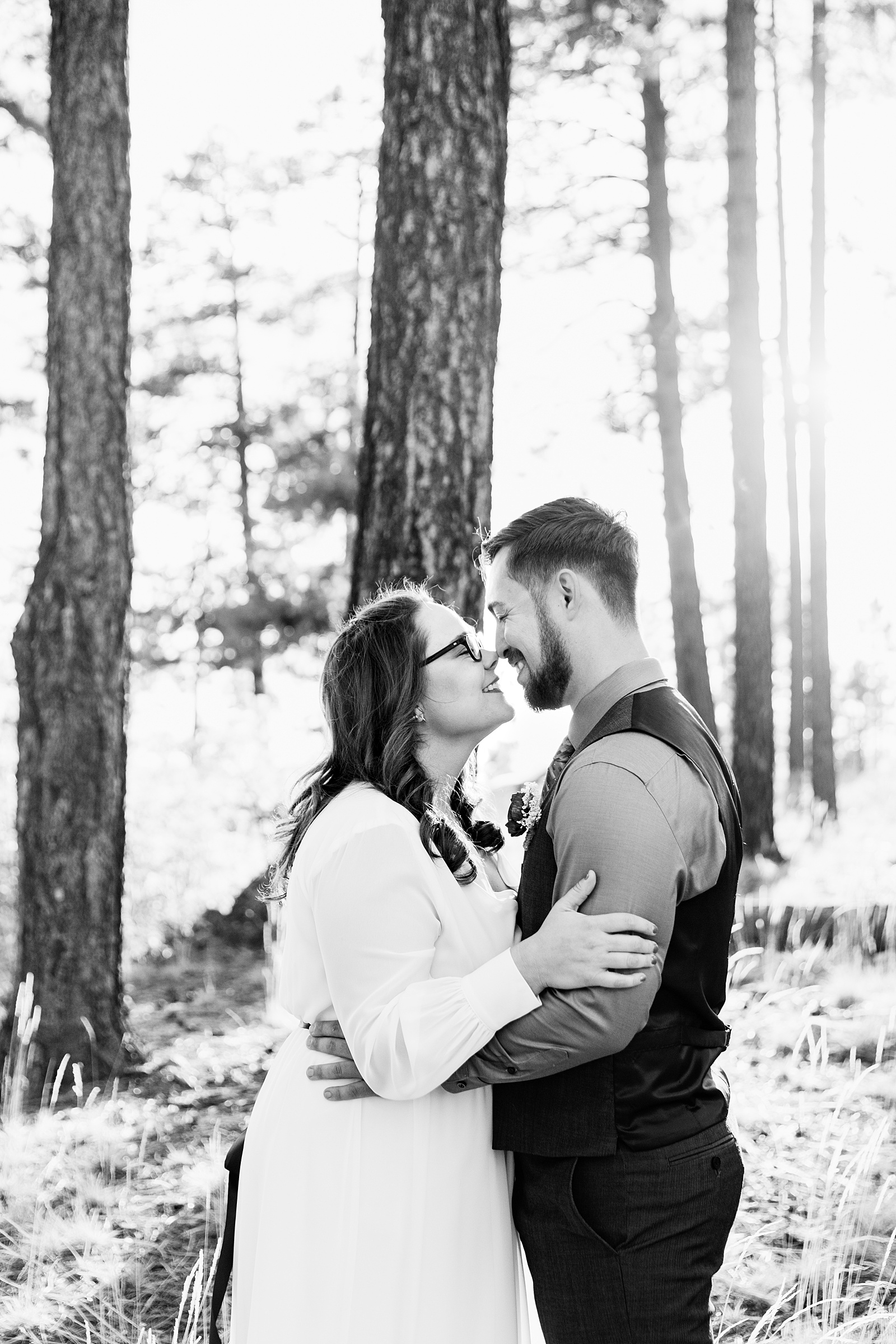 Bride and Groom share an intimate moment during their Mogollon Rim elopement by Payson elopement photographer PMA Photography.