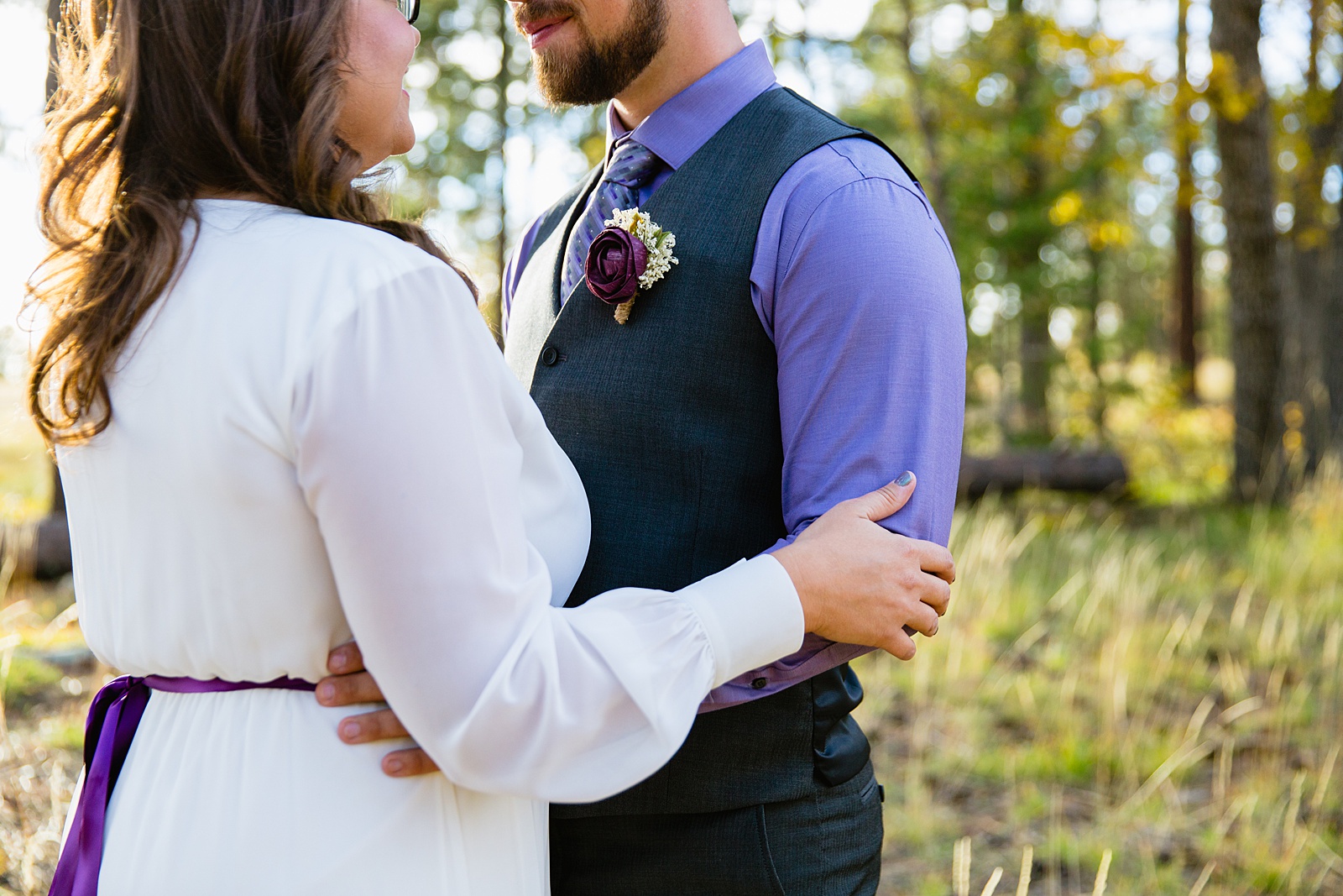 Bride and Groom share an intimate moment during their Mogollon Rim elopement by Payson elopement photographer PMA Photography.