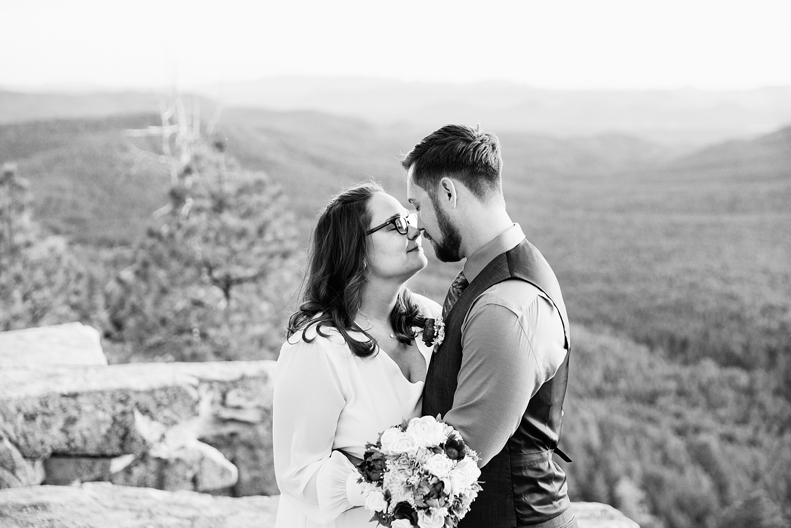 Bride and Groom share an intimate moment at their Mogollon Rim elopement by Arizona elopement photographer PMA Photography.