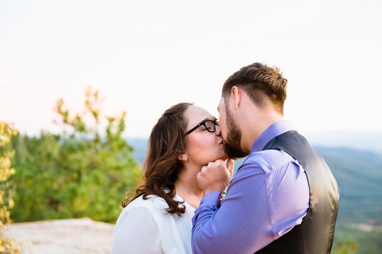 Bride and Groom share a kiss during their Mogollon Rim elopement by Payson elopement photographer PMA Photography.
