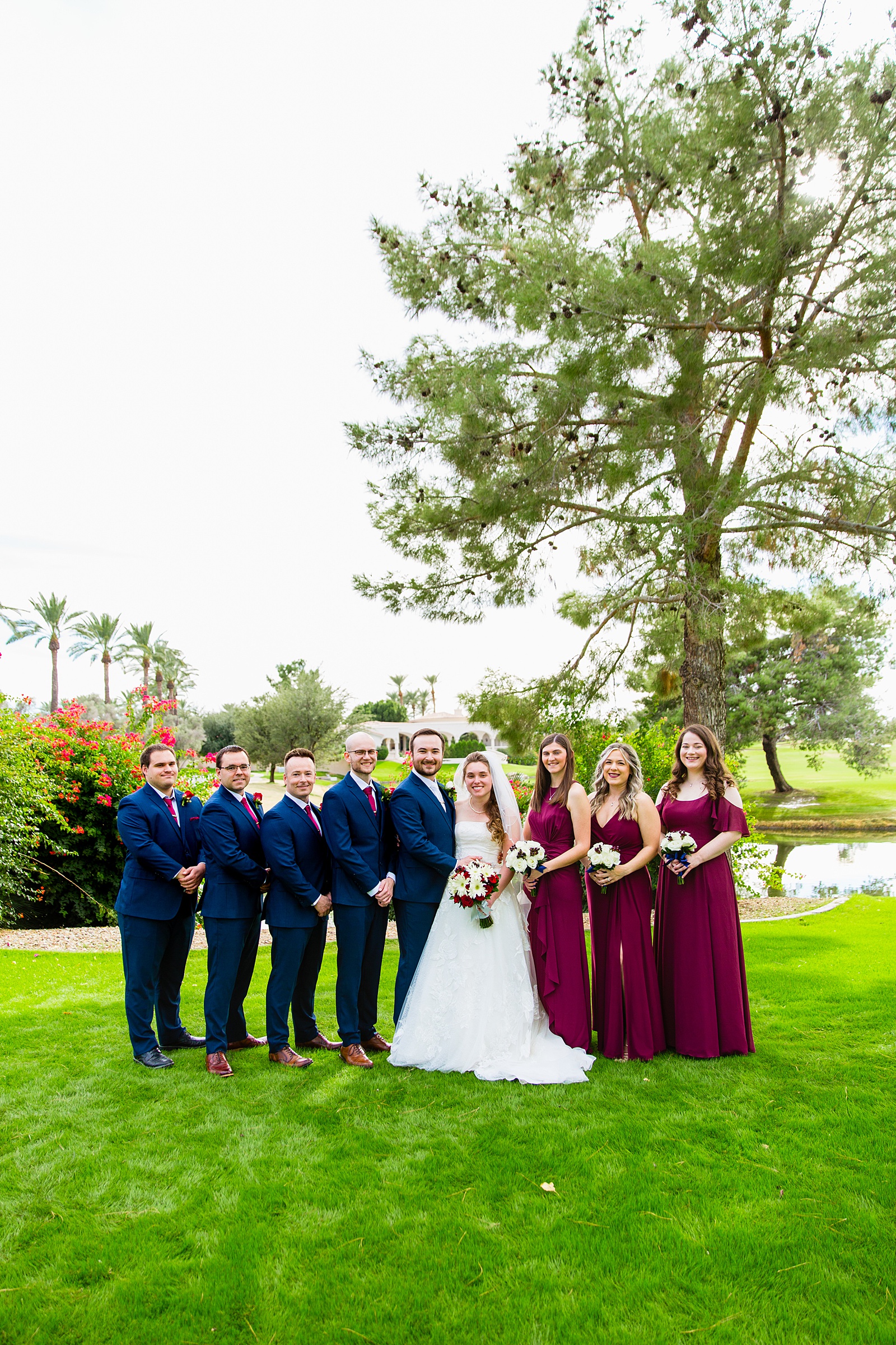 Bridal party together at a Ocotillo Oasis wedding by Arizona wedding photographer PMA Photography.