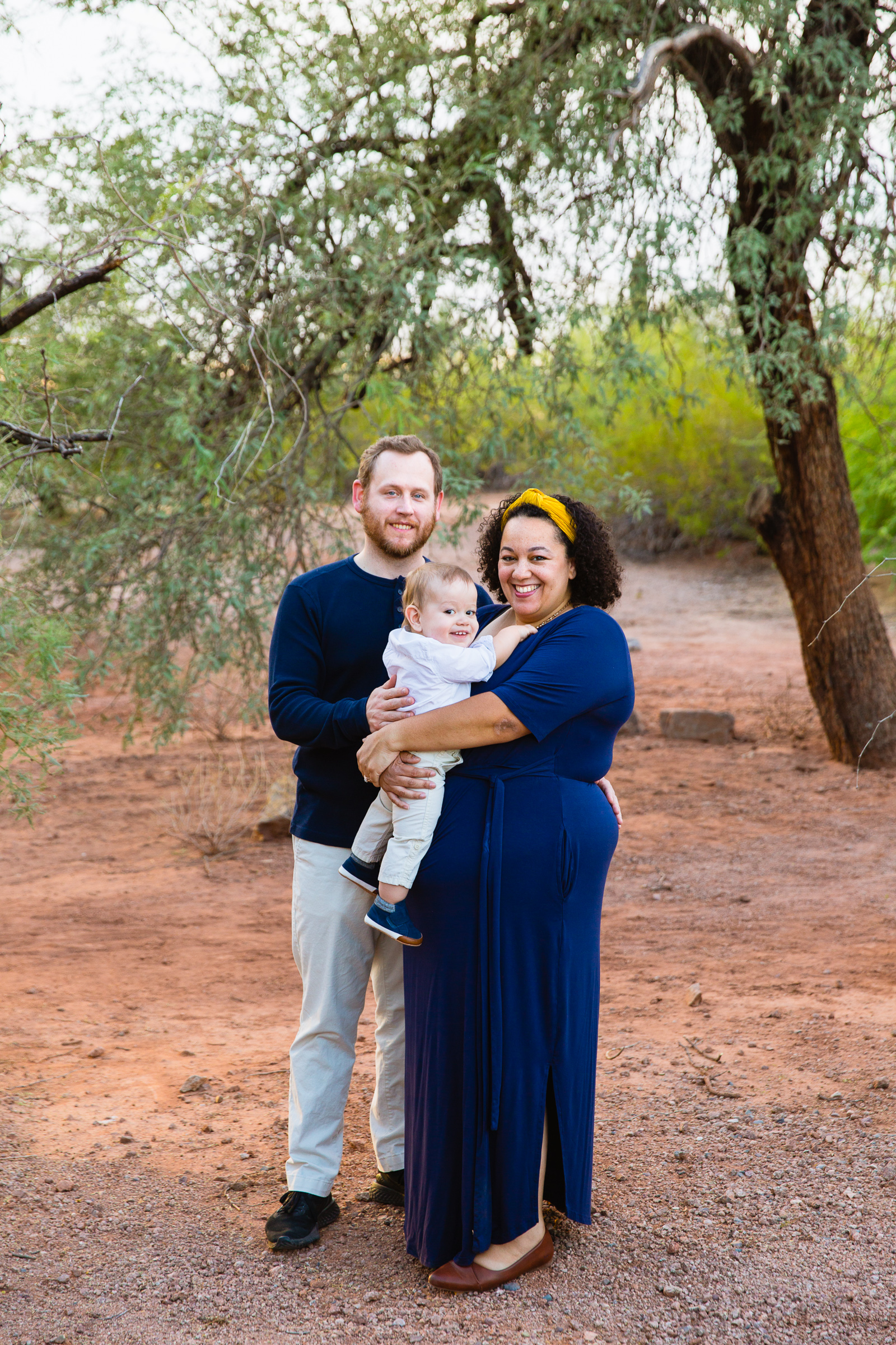 Family pose during their Phoenix family session by Arizona family photographer PMA Photography.