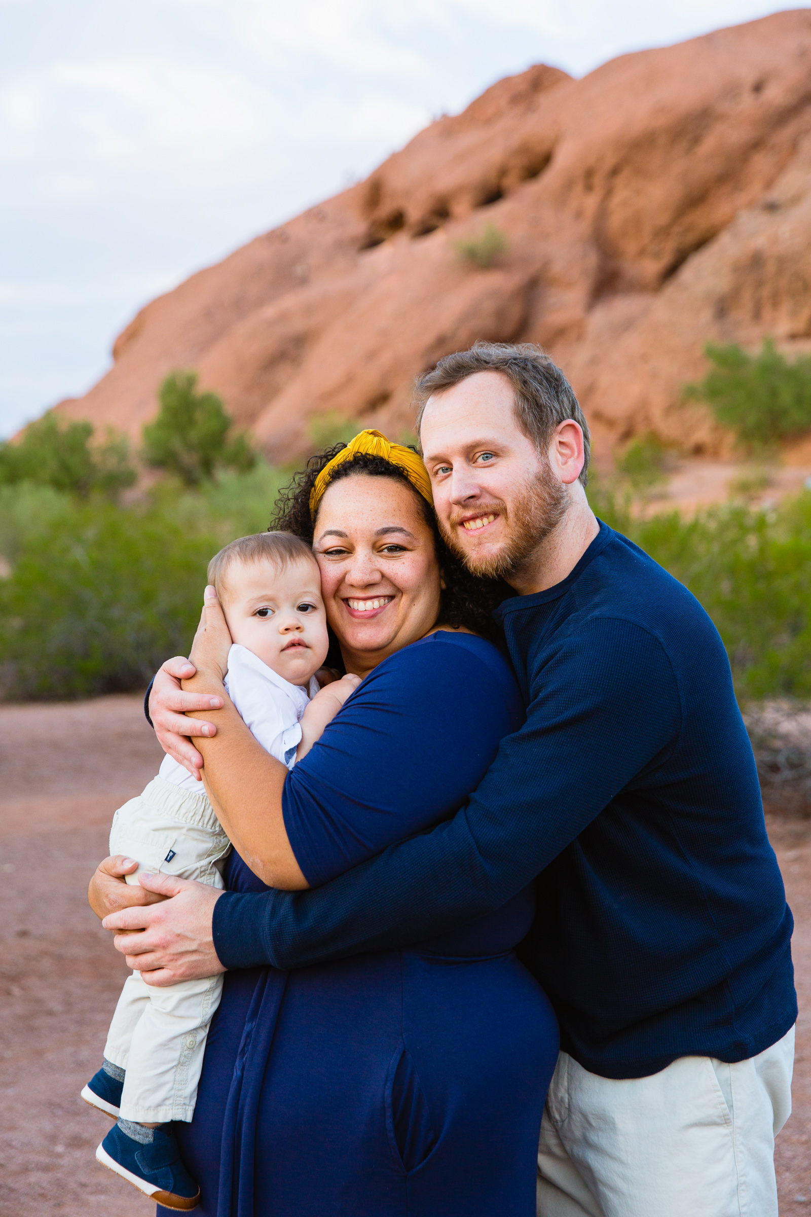Family pose for their Papago Park family session by Phoenix family photographer PMA Photography.