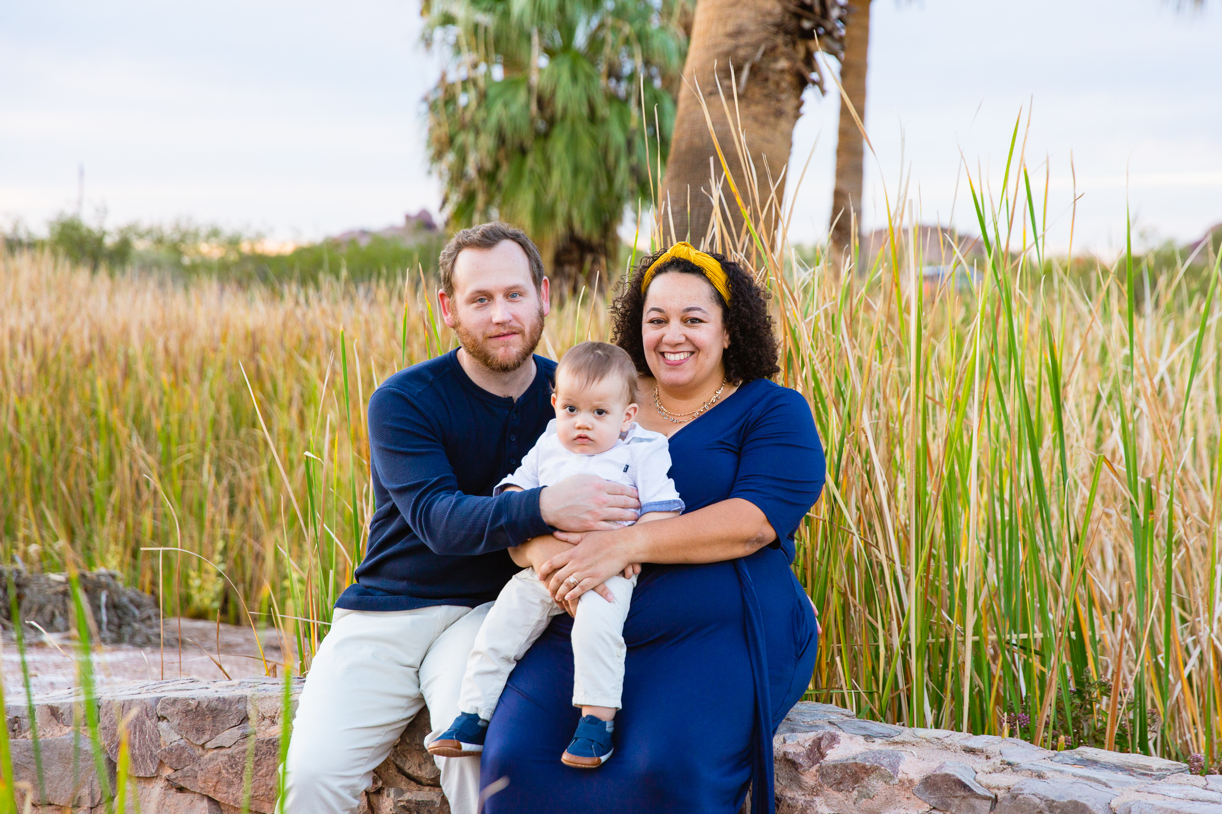 Family pose during their Phoenix family session by Arizona family photographer PMA Photography.
