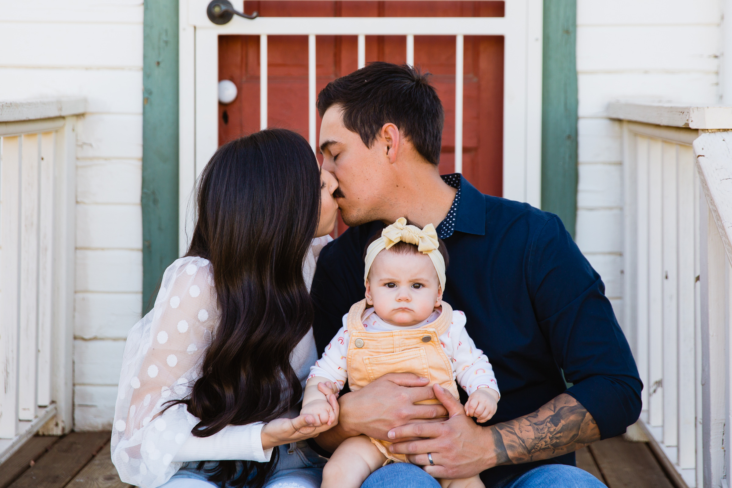 Family pose for their Sahuaro Ranch family session by Glendale family photographer PMA Photography.