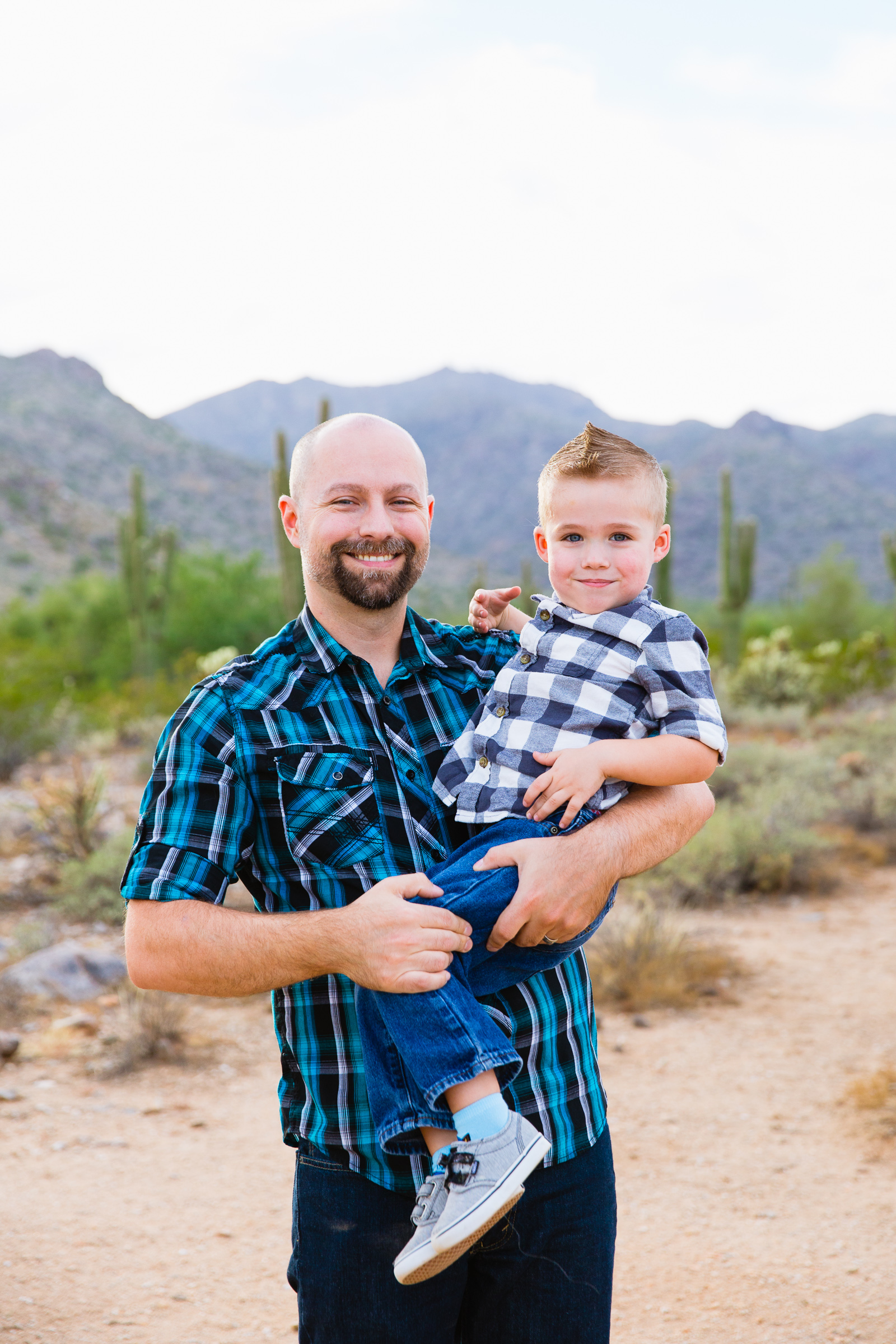 Father and son during their White Tanks family session by Waddell family photographer PMA Photography.