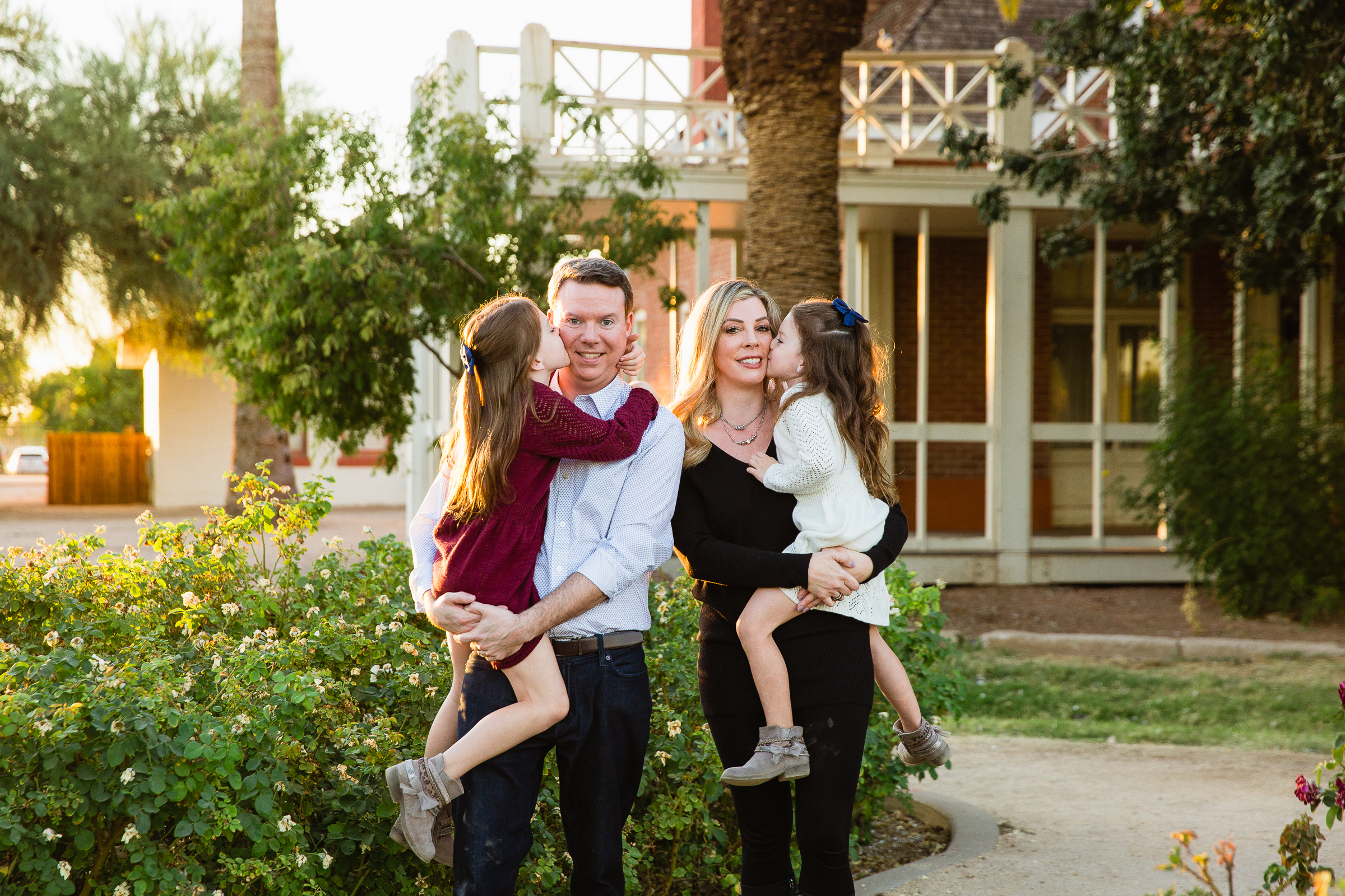 Family having fun together at their Glendale family session by Arizona family photographer PMA Photography.