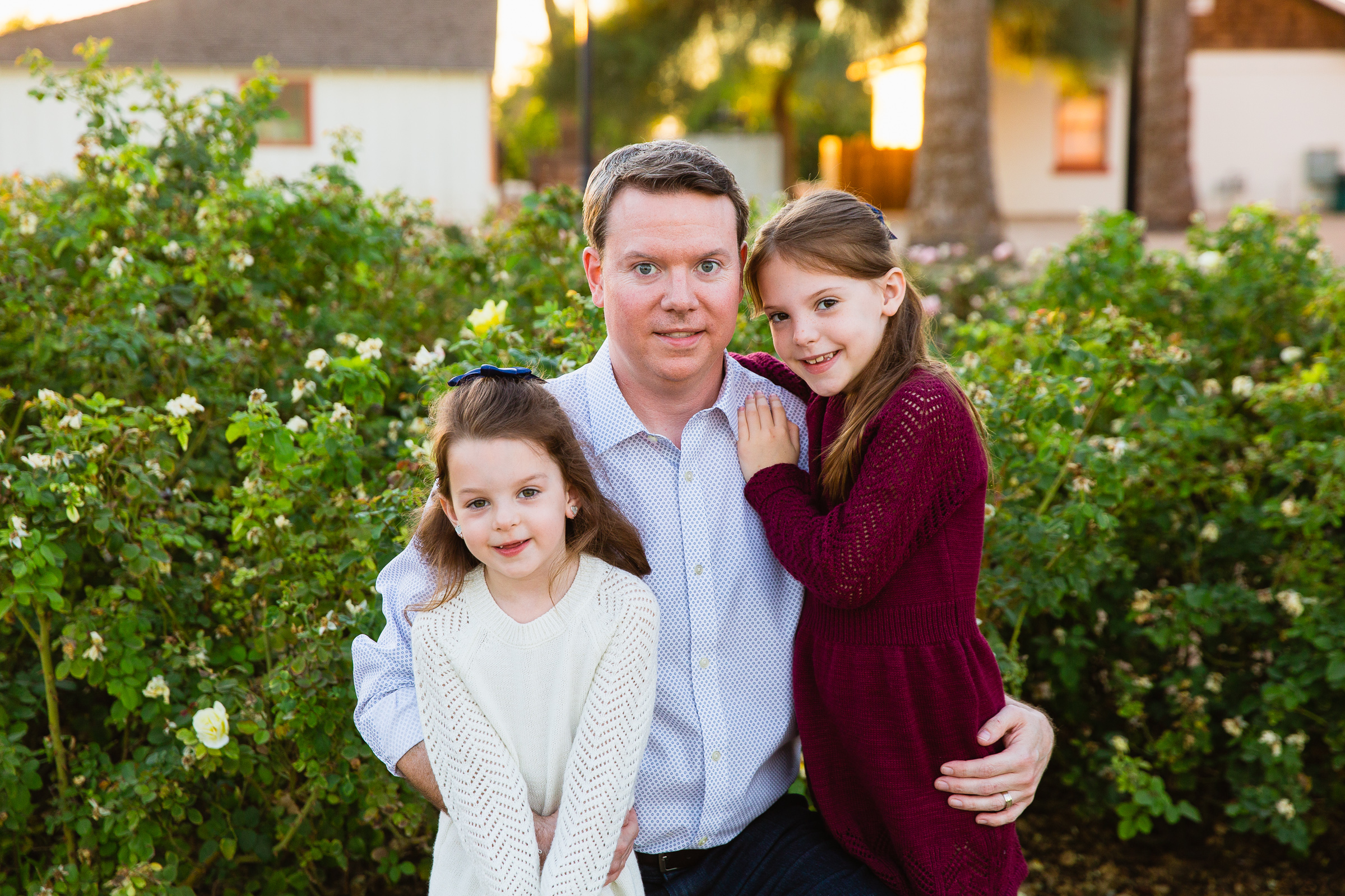 Father and daughters during their Glendale family session by Arizona family photographer PMA Photography.