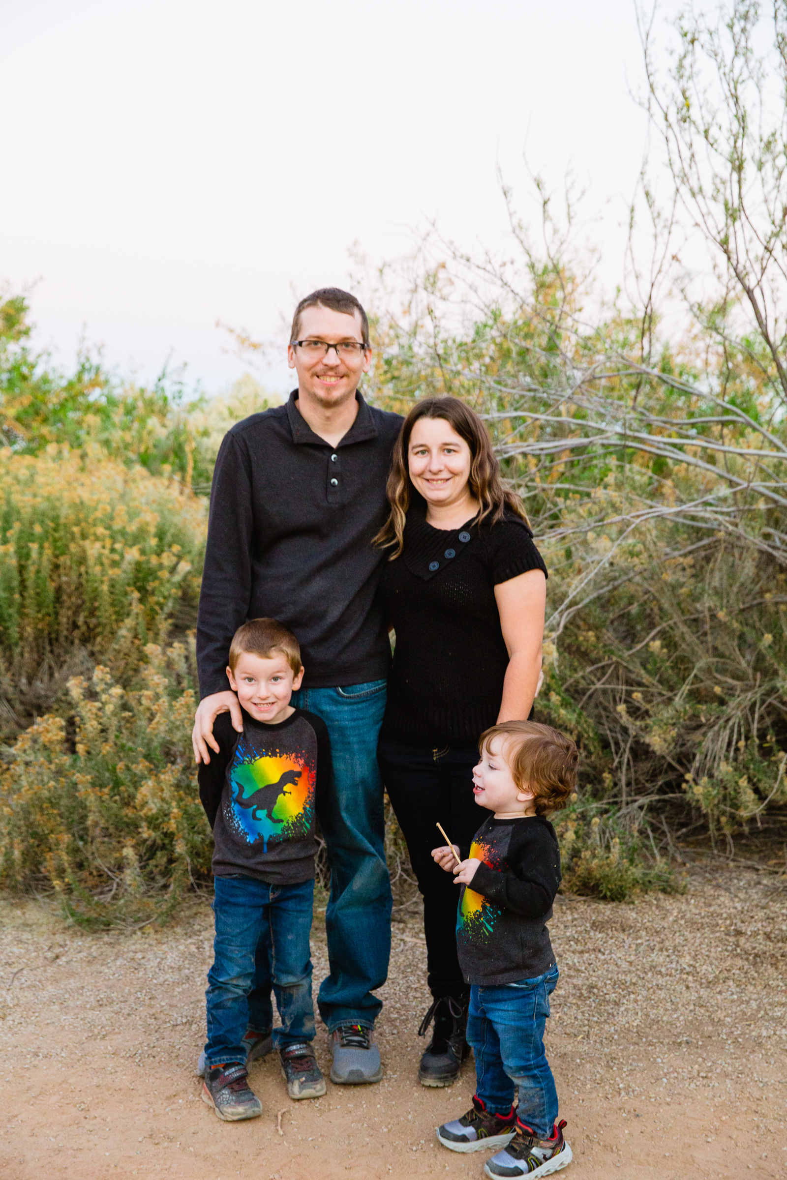 Family pose during their Gilbert family session by Arizona family photographer PMA Photography.