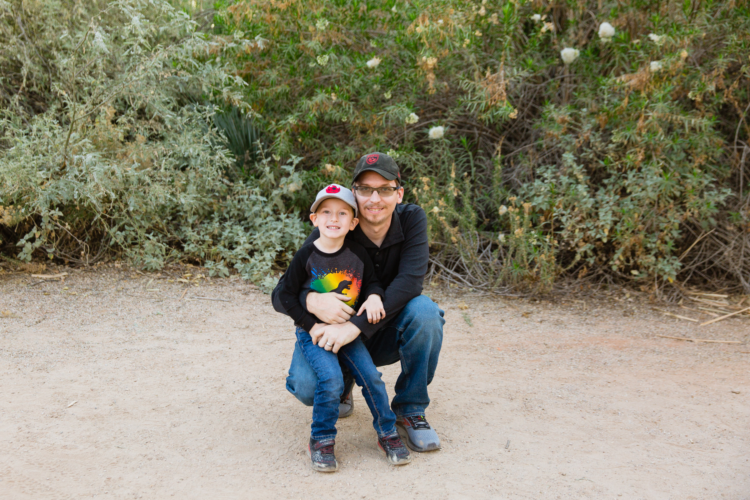 Father and son during their Riparian Preserve at Water Ranch family session by Gilbert family photographer PMA Photography.