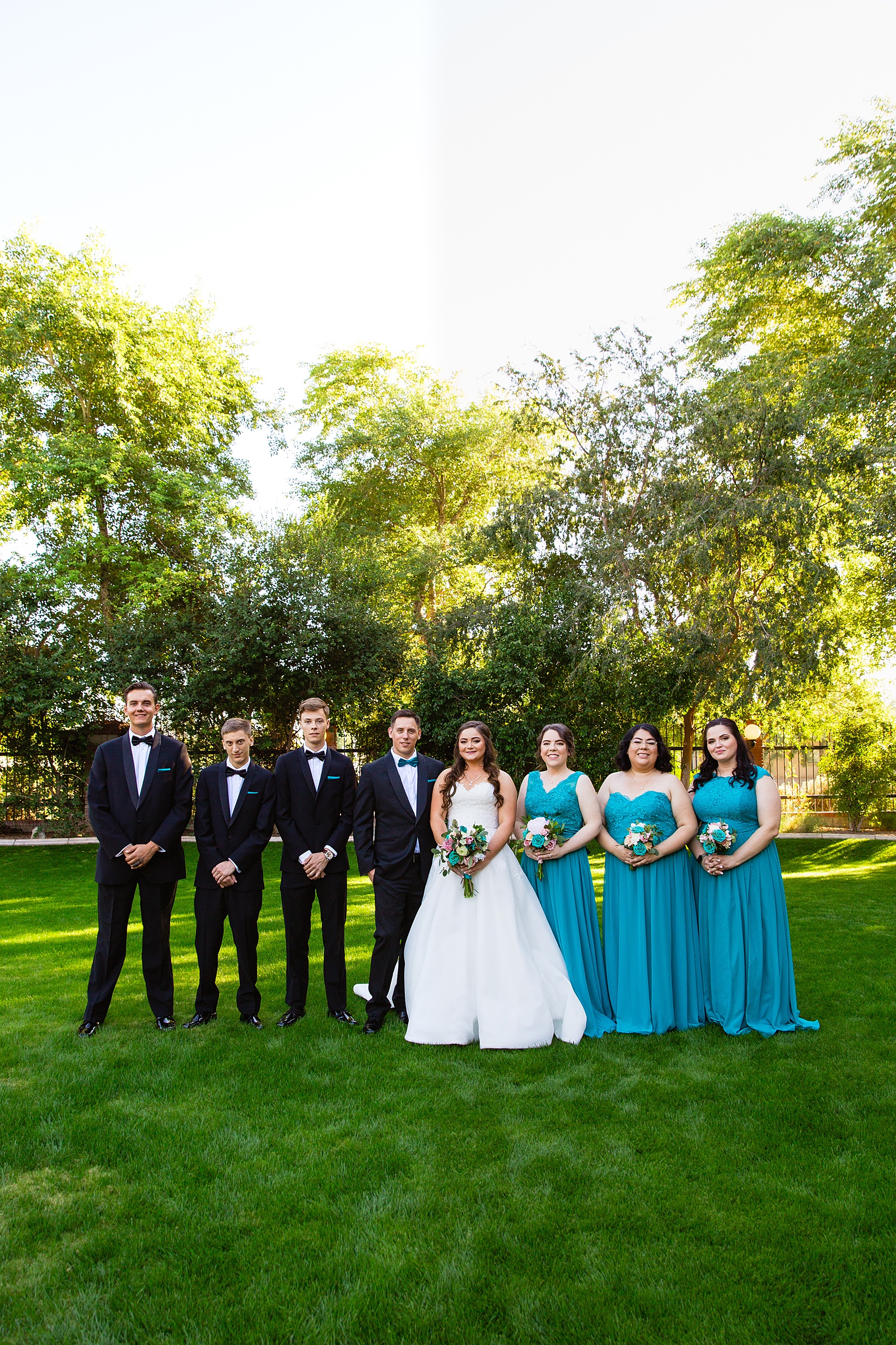 Bridal party together at a Stonebridge Manor wedding by Arizona wedding photographer PMA Photography.