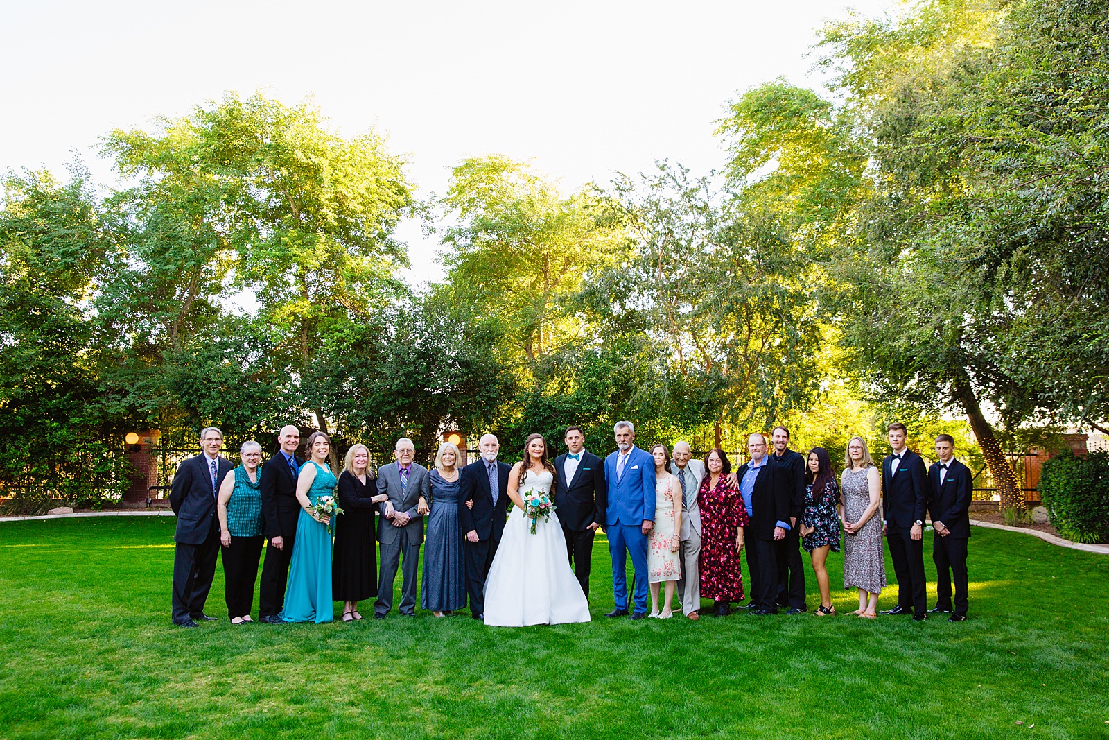 Family portraits at a Stonebridge Manor wedding by Arizona wedding photographer PMA Photography.