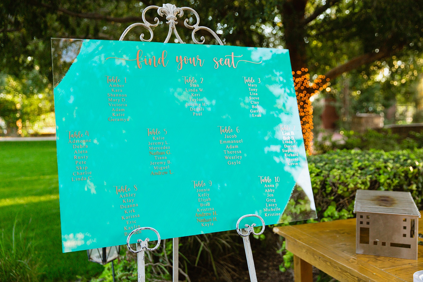 Teal and rose gold "Find Your Seat" wedding table sign for a garden wedding by Phoenix wedding photographer PMA Photography.