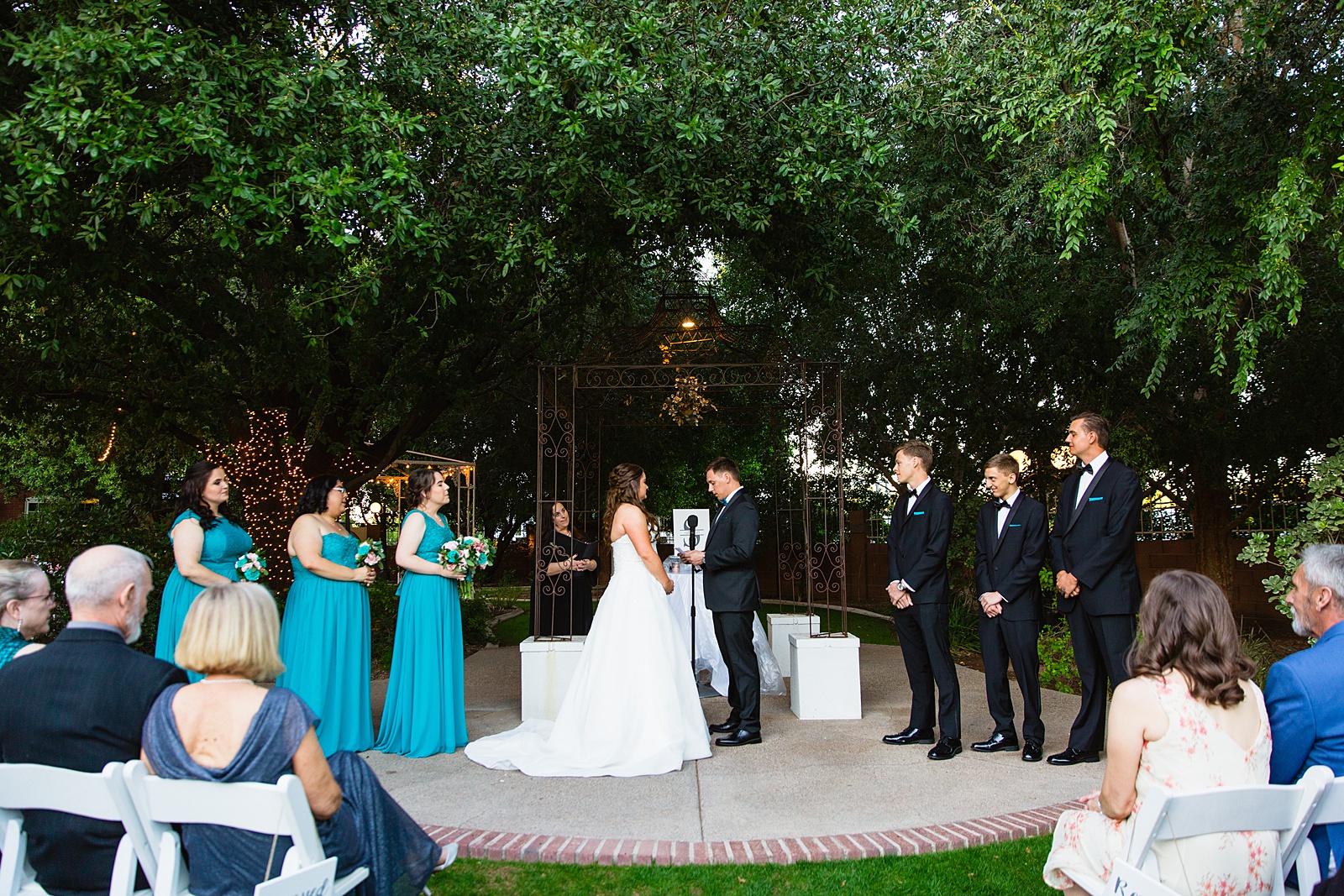 Wedding ceremony at Stonebridge Manor by Phoenix wedding photographer PMA Photography.