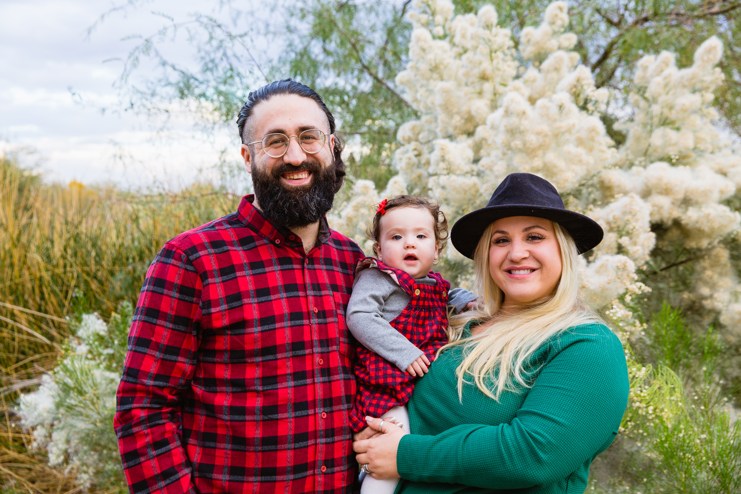 Family pose during their Gilbert family session by Arizona family photographer PMA Photography.