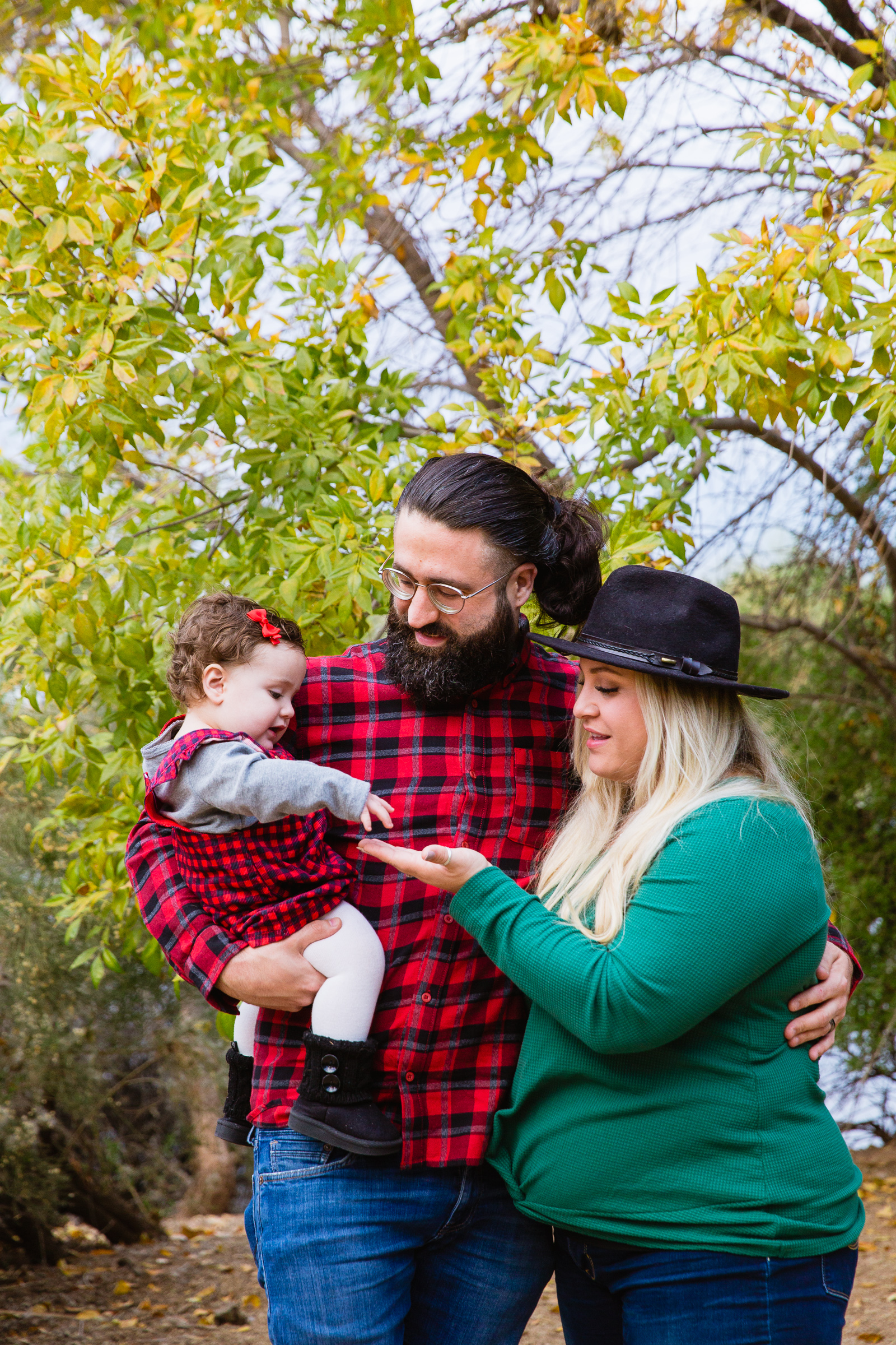 Family having fun together at their Riparian Preserve at Water Ranch family session by Gilbert family photographer PMA Photography.