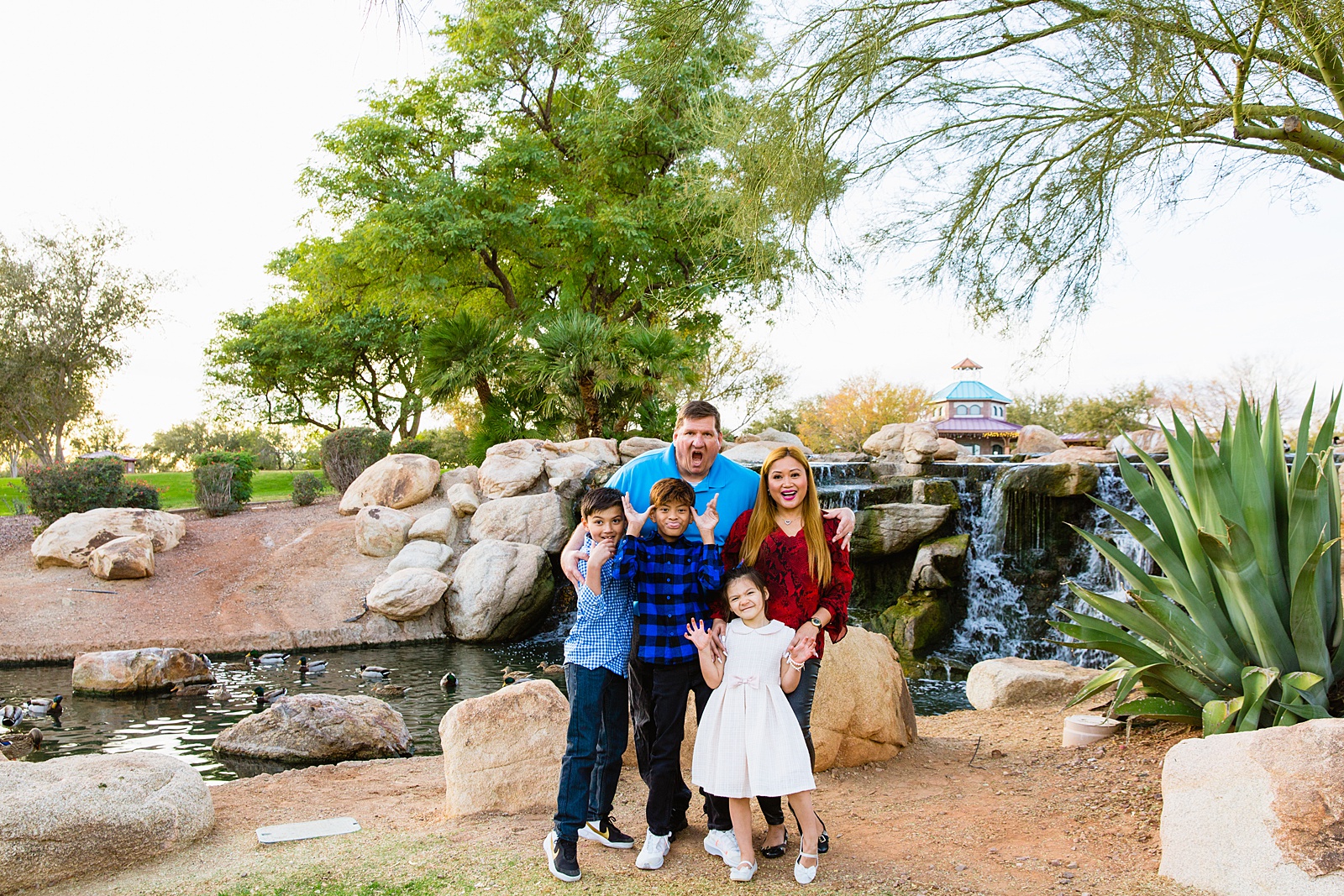 Family having fun together at their Anthem Park family session by Anthem family photographer PMA Photography.