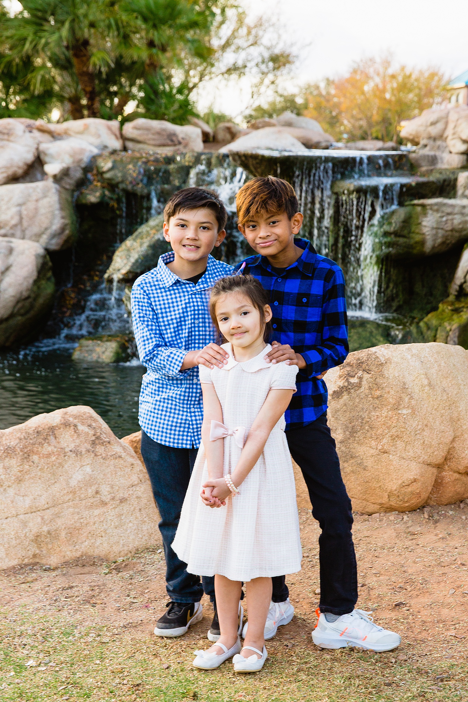Kids pose during their Anthem family session by Arizona family photographer PMA Photography.