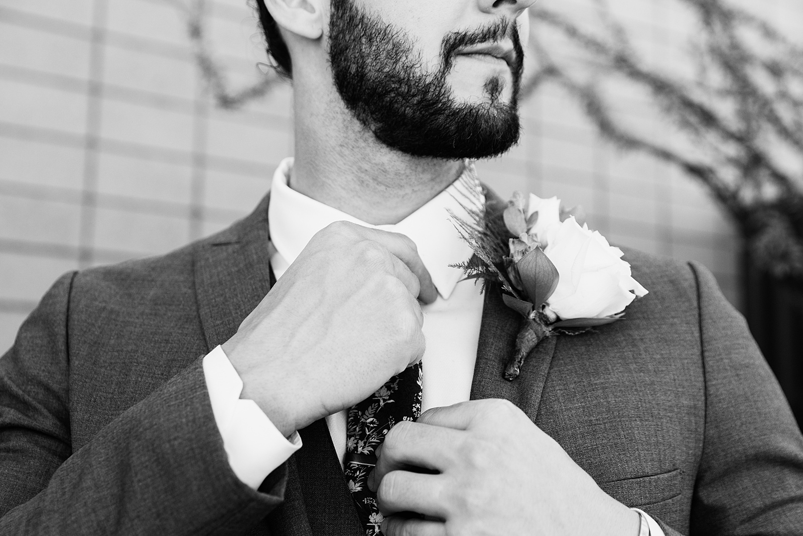 Groom getting ready for his wedding by Phoenix wedding photographers PMA Photography.