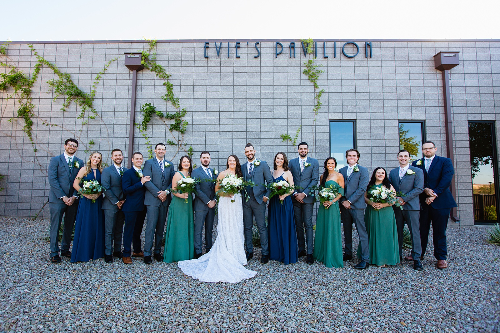 Mixed gender bridal party together at a Papago Events wedding by Arizona wedding photographer PMA Photography.