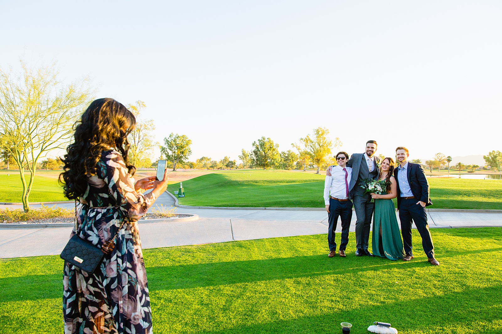 Guests pose together at Papago Events wedding reception by Phoenix wedding photographer PMA Photography