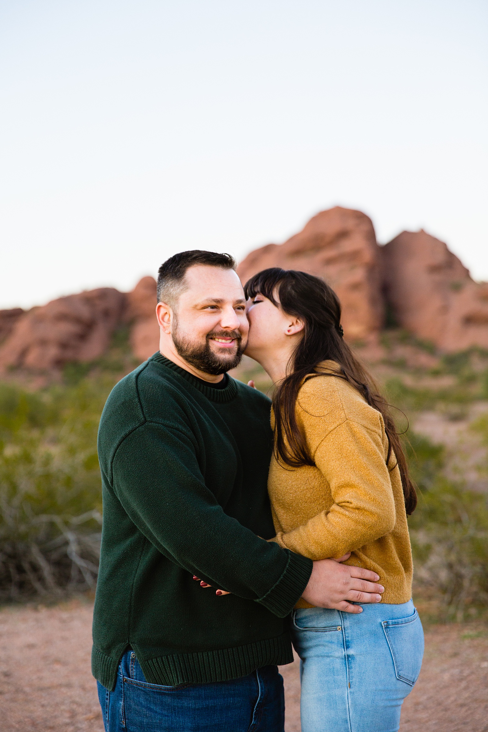 Couple laugh together during their Papago Park engagement session by Phoenix engagement photographer PMA Photography.
