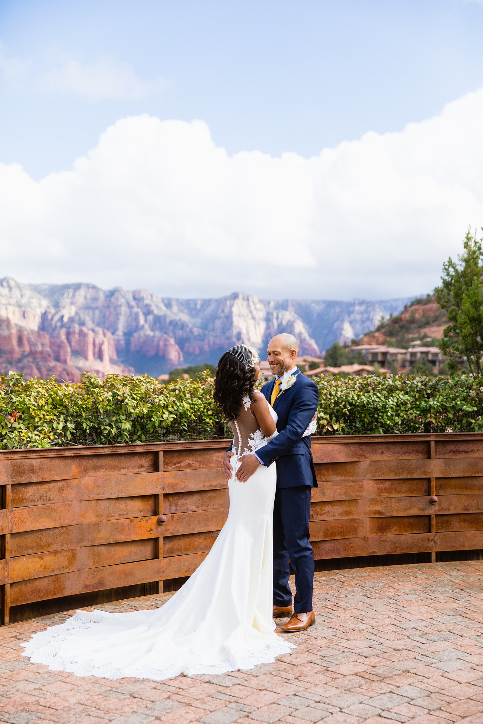 Newlyweds share an intimate moment during their Agave of Sedona wedding by Sedona wedding photographer PMA Photography.