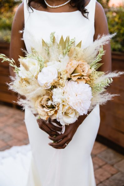 Bride's boho dried flower bouquet by PMA Photography.