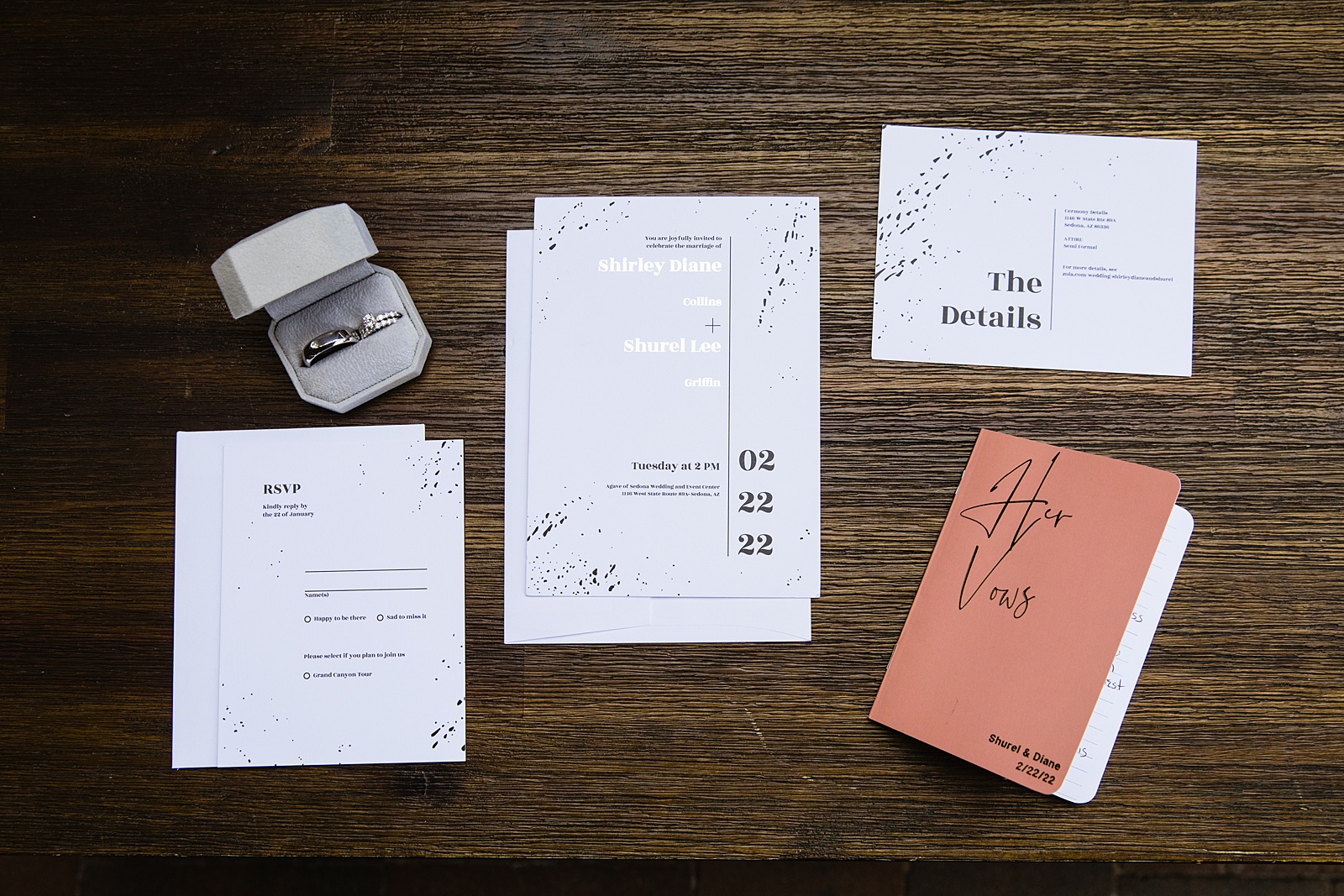 Couple's simple modern wedding invitations with wedding rings and vow book by PMA Photography.
