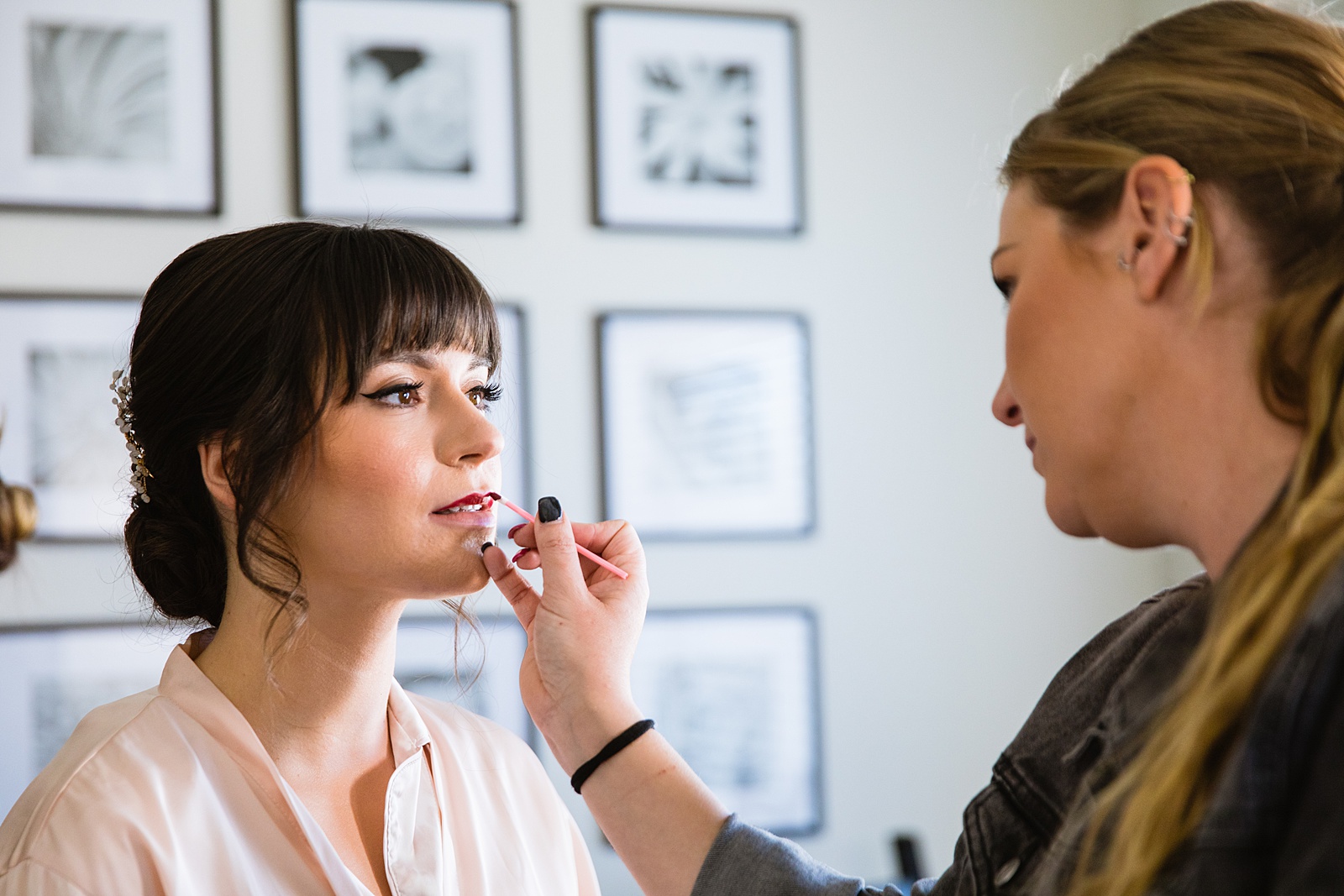 Bride getting her make-up done by Arizona wedding photographer PMA Photography.