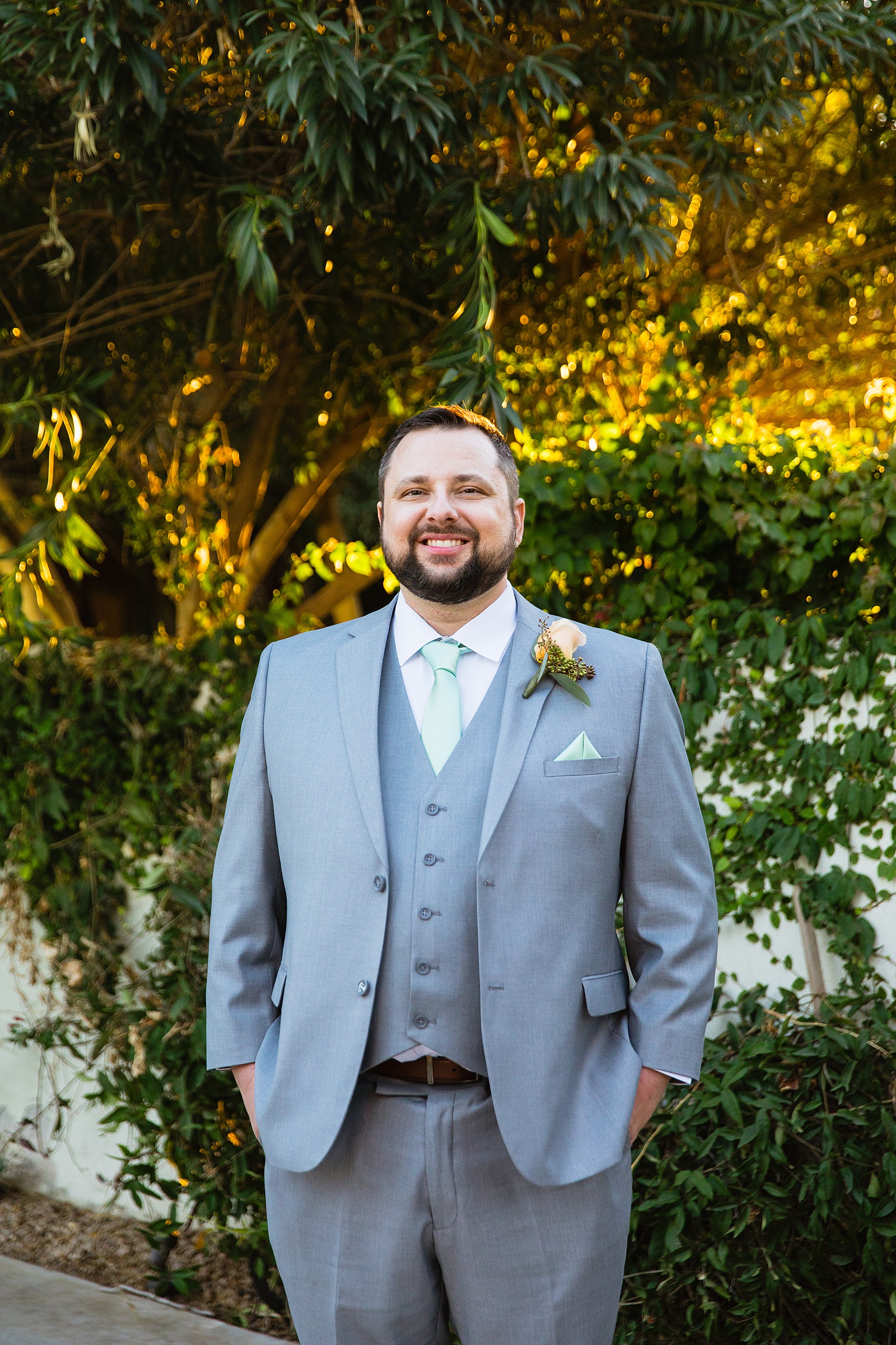 Groom's light grey suit for his Bella Rose Estate wedding by PMA Photography.