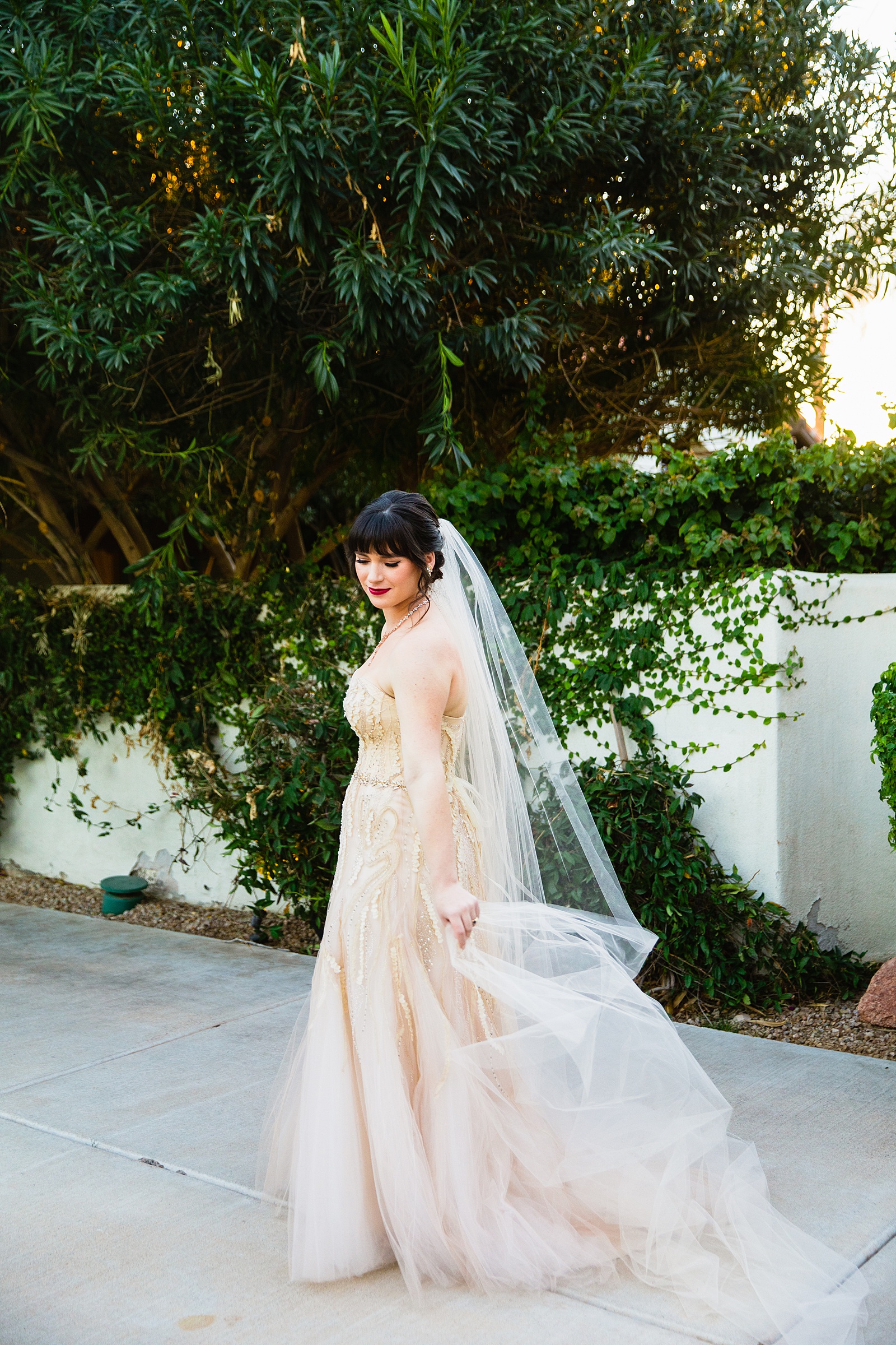 Bride's romantic nude garden wedding dress for her Bella Rose Estate wedding by PMA Photography.