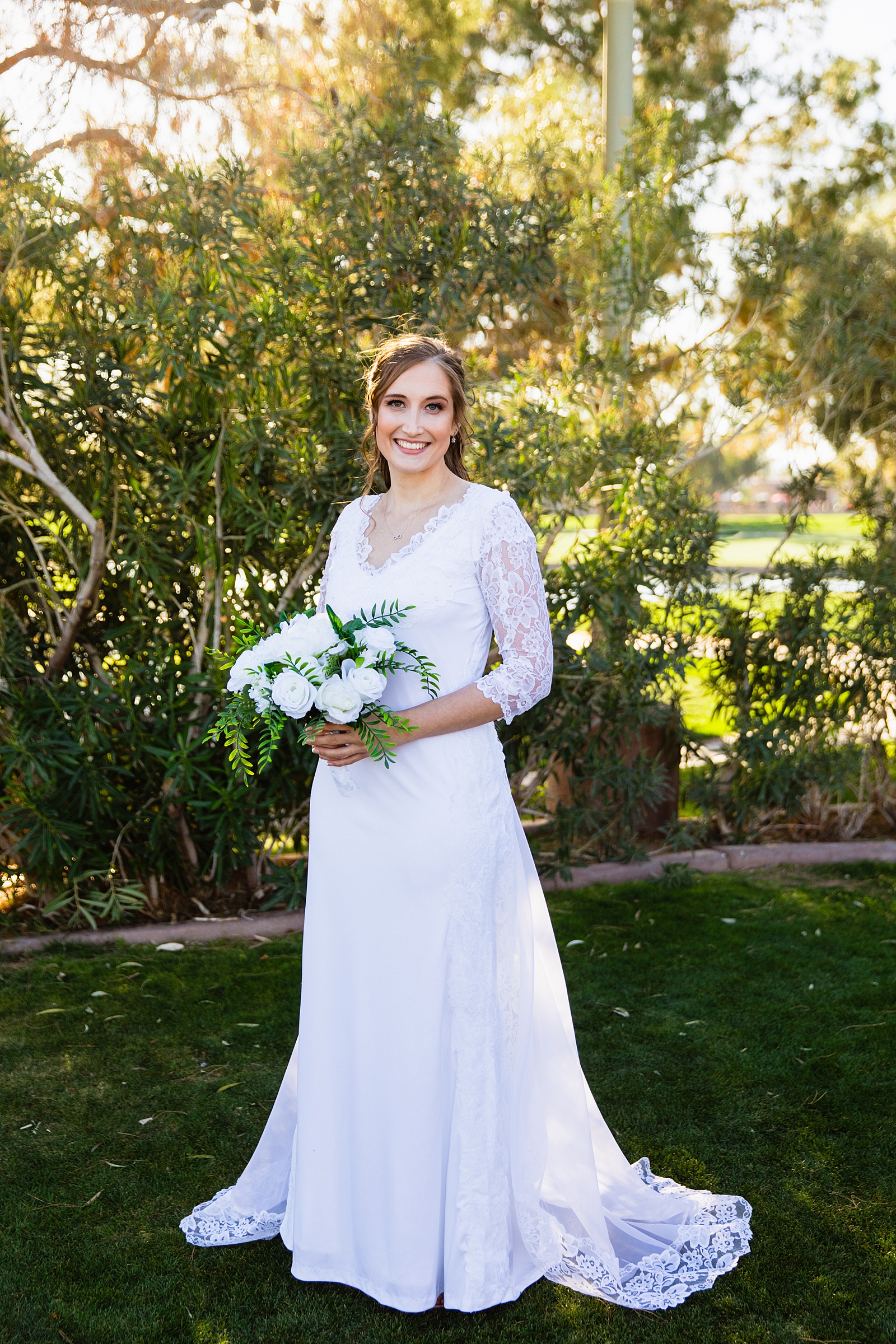 Bride's simple lace wedding dress for her Ocotillo Oasis wedding by PMA Photography.