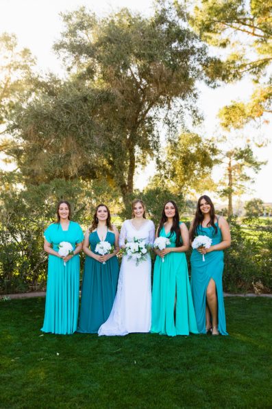 Bride and bridesmaids together at a Ocotillo Oasis wedding by Arizona wedding photographer PMA Photography.
