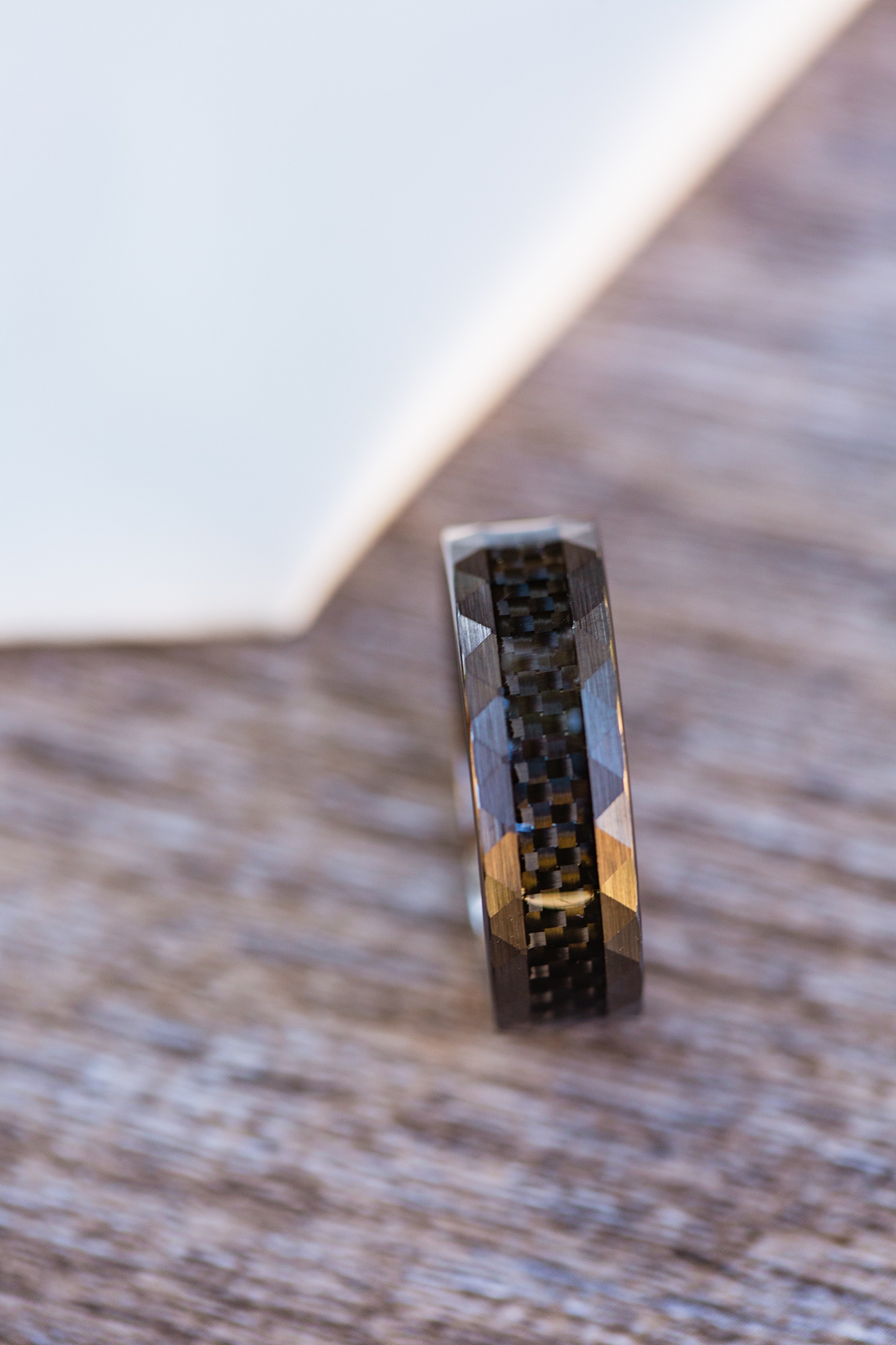 Grooms unique black wedding ring by PMA Photography.