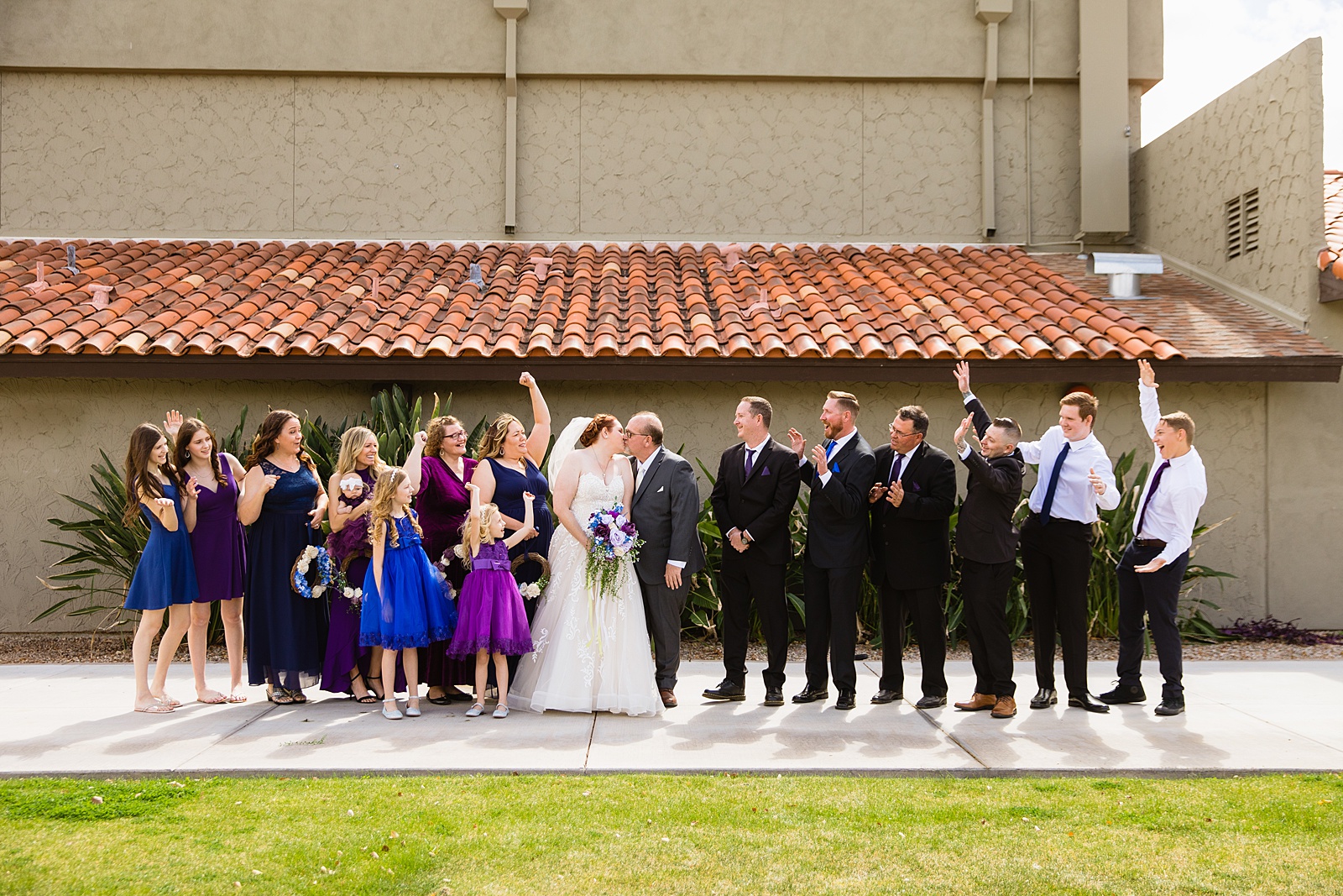 Bridal party having fun together at Sun Valley Church weding by Arizona wedding photographer PMA Photography.