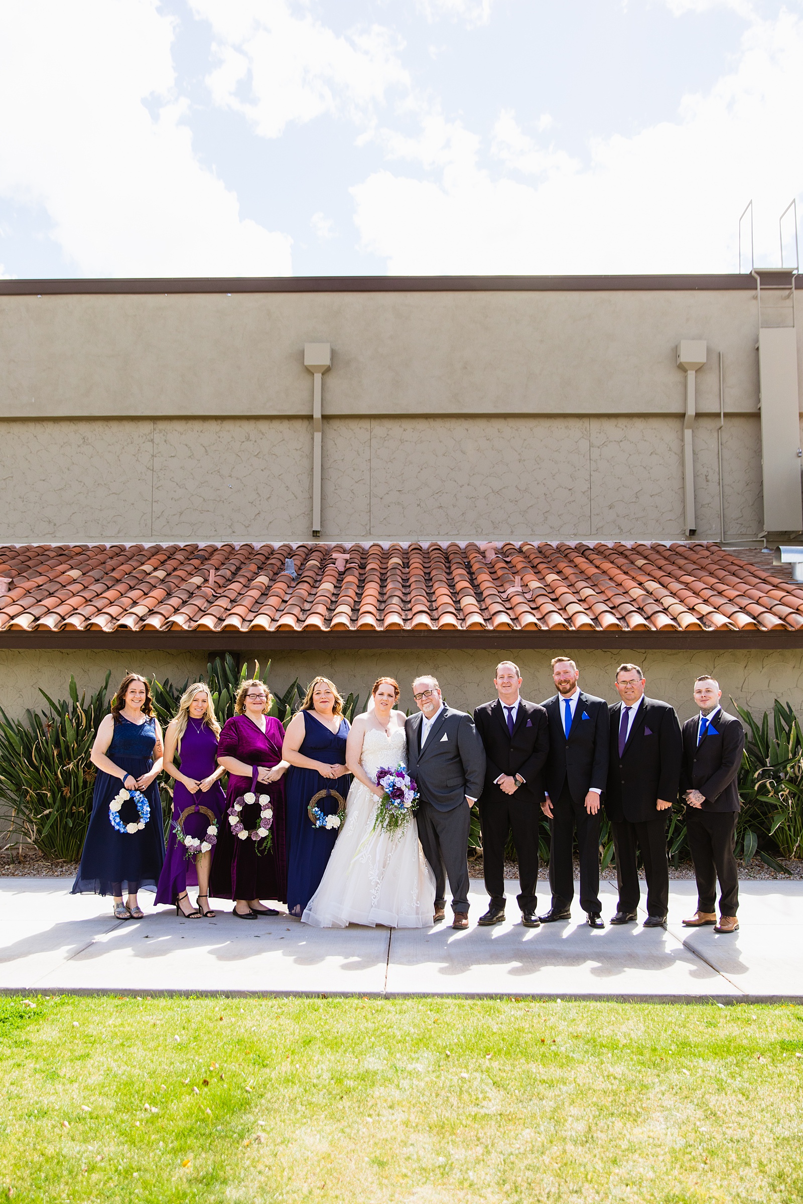 Bridal party together at a Sun Valley Church wedding by Arizona wedding photographer PMA Photography.