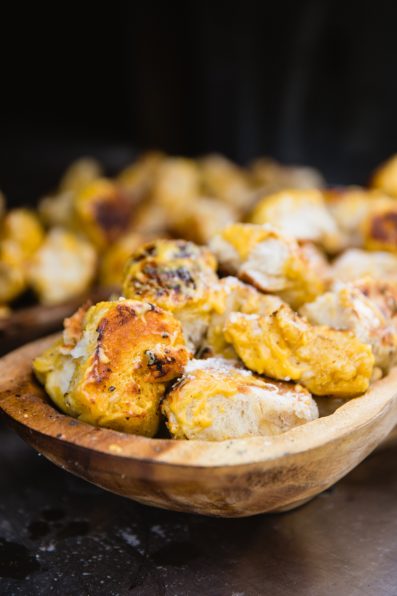 Garlic knots from a wood fire pizza company for a 101 Polo Club wedding reception by PMA Photography.