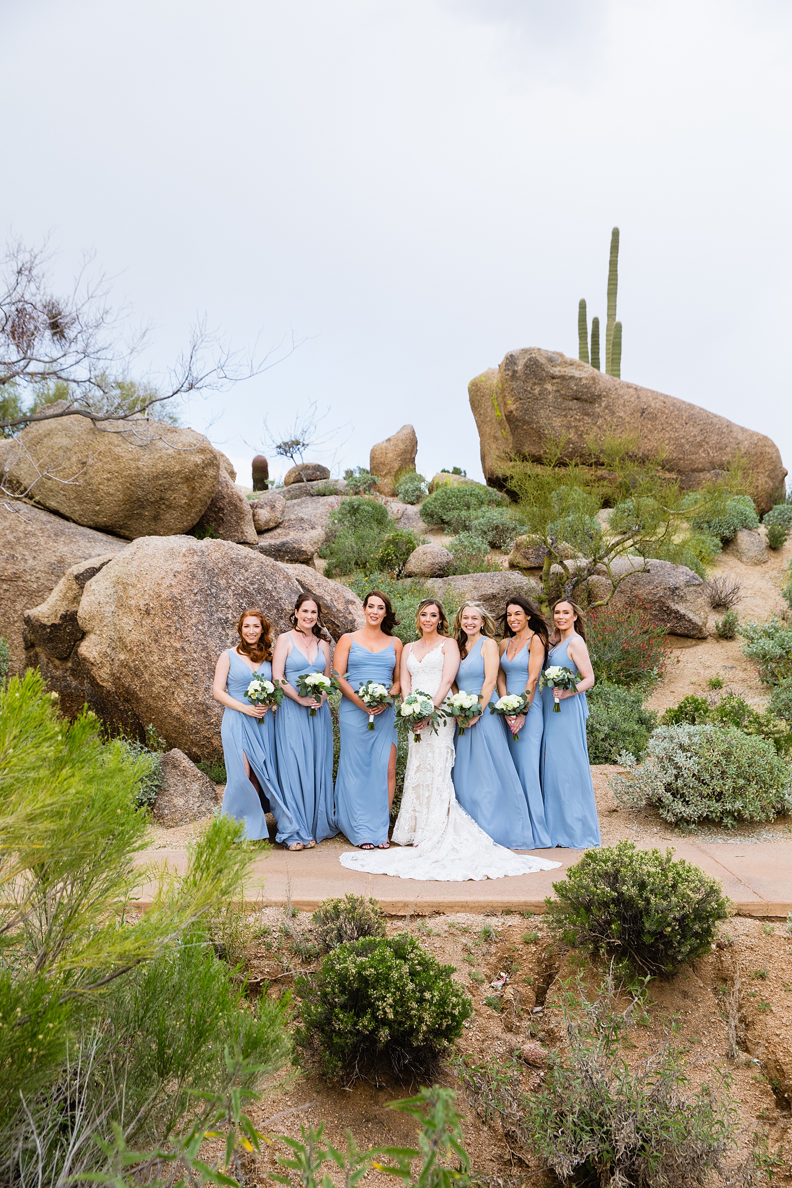 Bride and bridesmaids together at a Troon North wedding by Arizona wedding photographer PMA Photography.