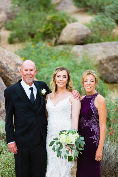 Bride with her parents at a Troon North wedding by Scottsdale wedding photographer PMA Photography.